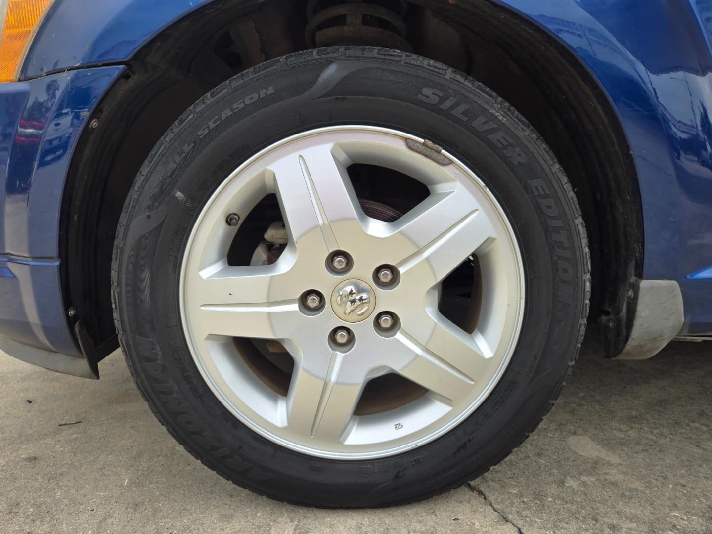 2009 BLUE /GRAY Dodge Caliber (1B3HB48A59D) with an 2.0L L4 DOHC 16V engine, Automatic transmission, located at 503 West Court, Seguin, TX, 78155, (830) 379-3373, 29.568621, -97.969803 - Photo#7