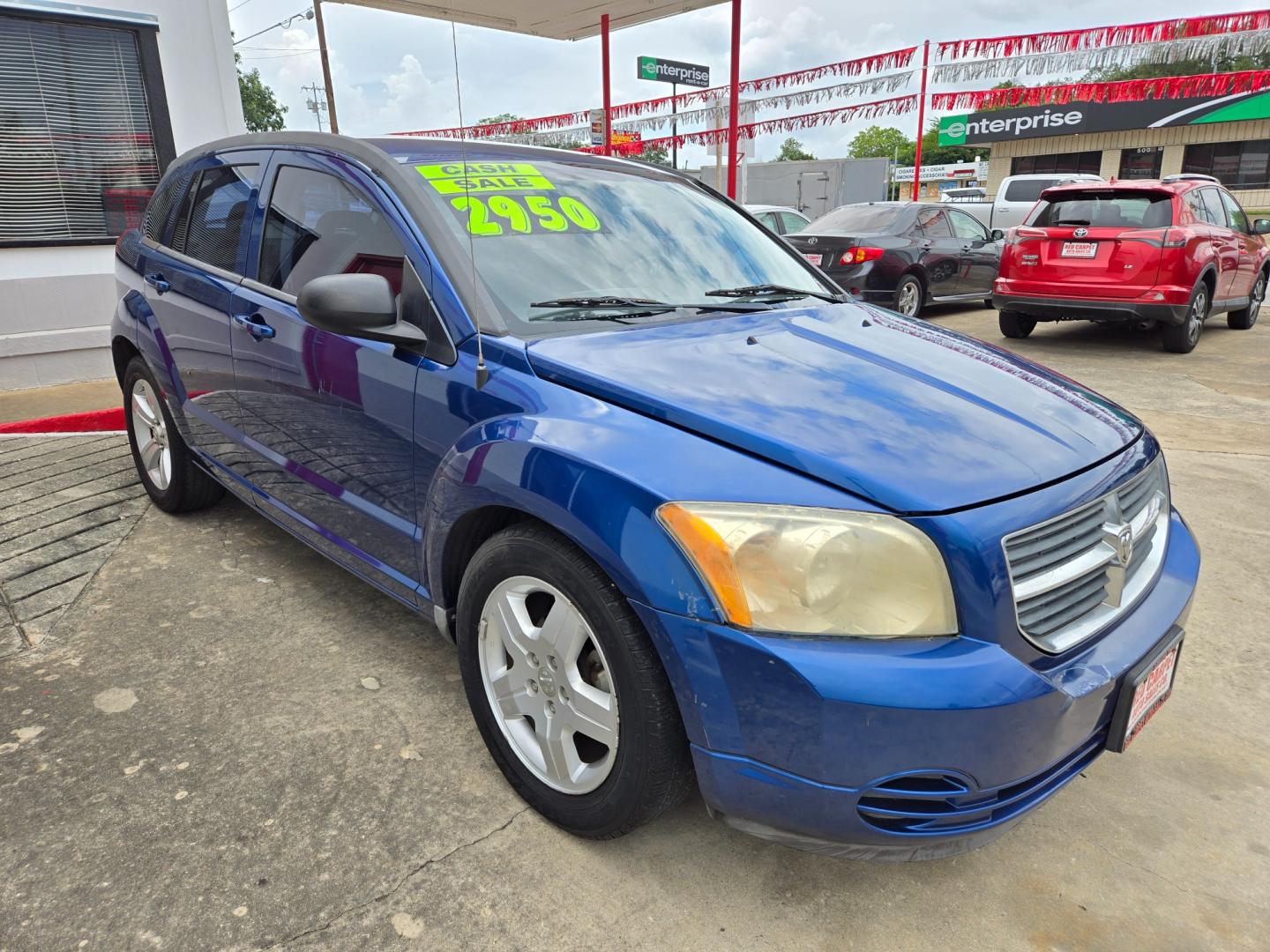 2009 BLUE /GRAY Dodge Caliber (1B3HB48A59D) with an 2.0L L4 DOHC 16V engine, Automatic transmission, located at 503 West Court, Seguin, TX, 78155, (830) 379-3373, 29.568621, -97.969803 - Photo#1