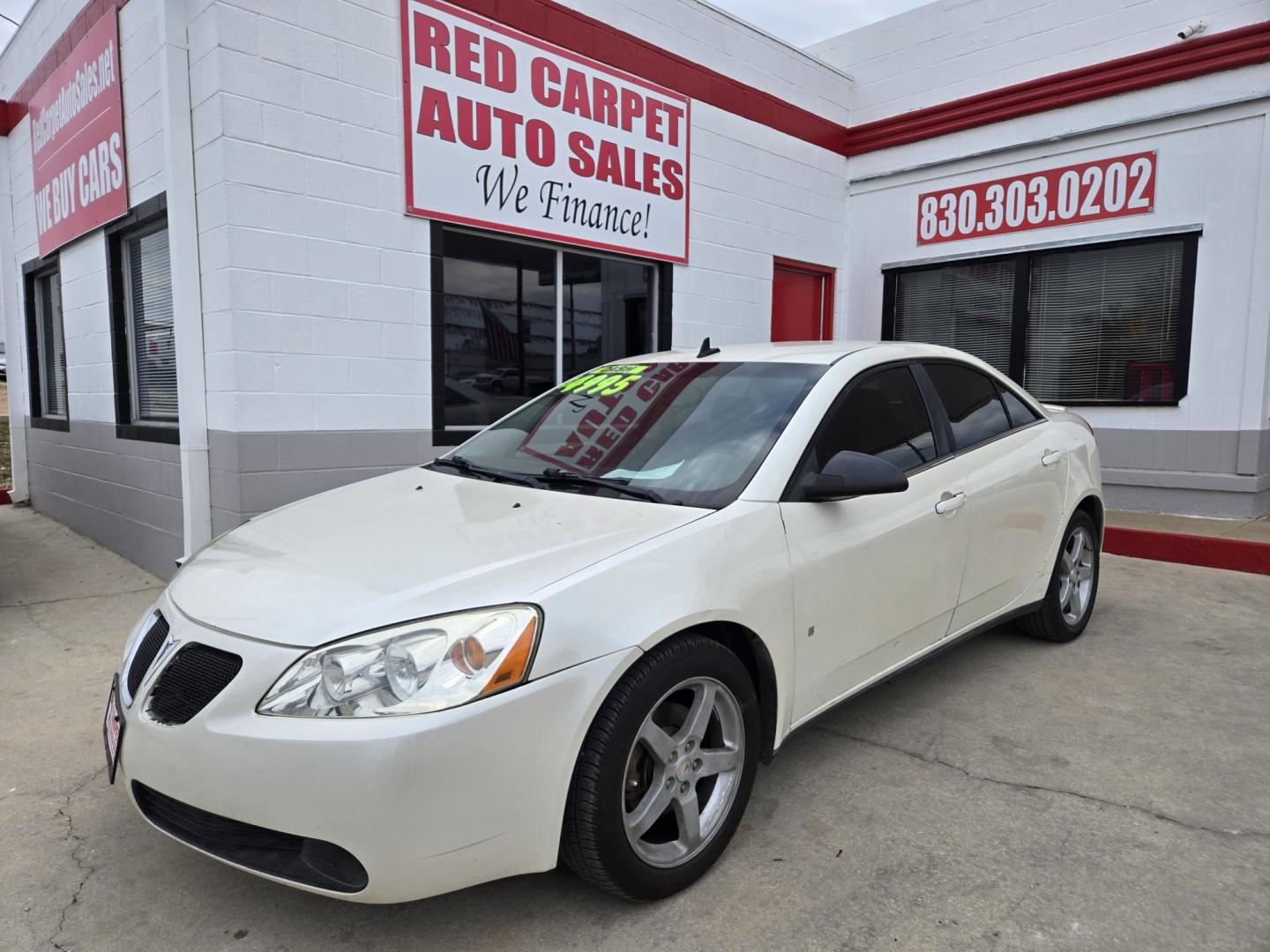 2009 WHITE /Black Pontiac G6 Sedan (1G2ZG57N794) with an 3.5L V6 OHV 12V engine, 4-Speed Automatic Overdrive transmission, located at 503 West Court, Seguin, TX, 78155, (830) 379-3373, 29.568621, -97.969803 - Photo#0