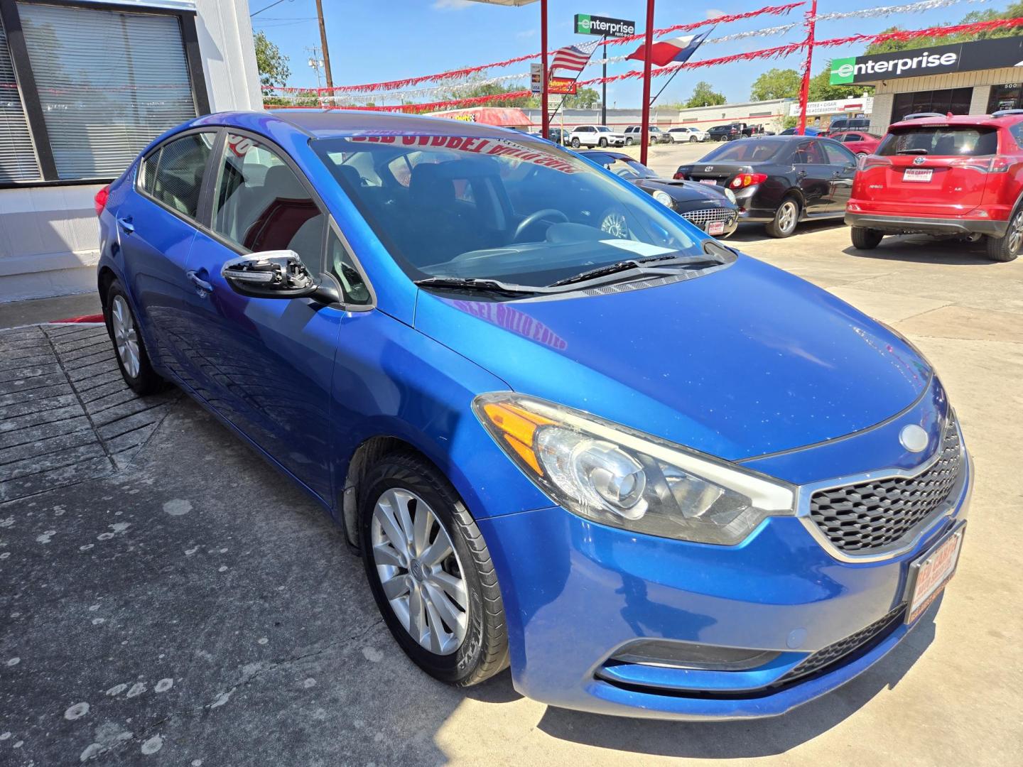 2014 Blue /Gray Kia Forte EX (KNAFX4A60E5) with an 1.8L L4 DOHC 16V engine, 6-Speed Automatic transmission, located at 503 West Court, Seguin, TX, 78155, (830) 379-3373, 29.568621, -97.969803 - Photo#1