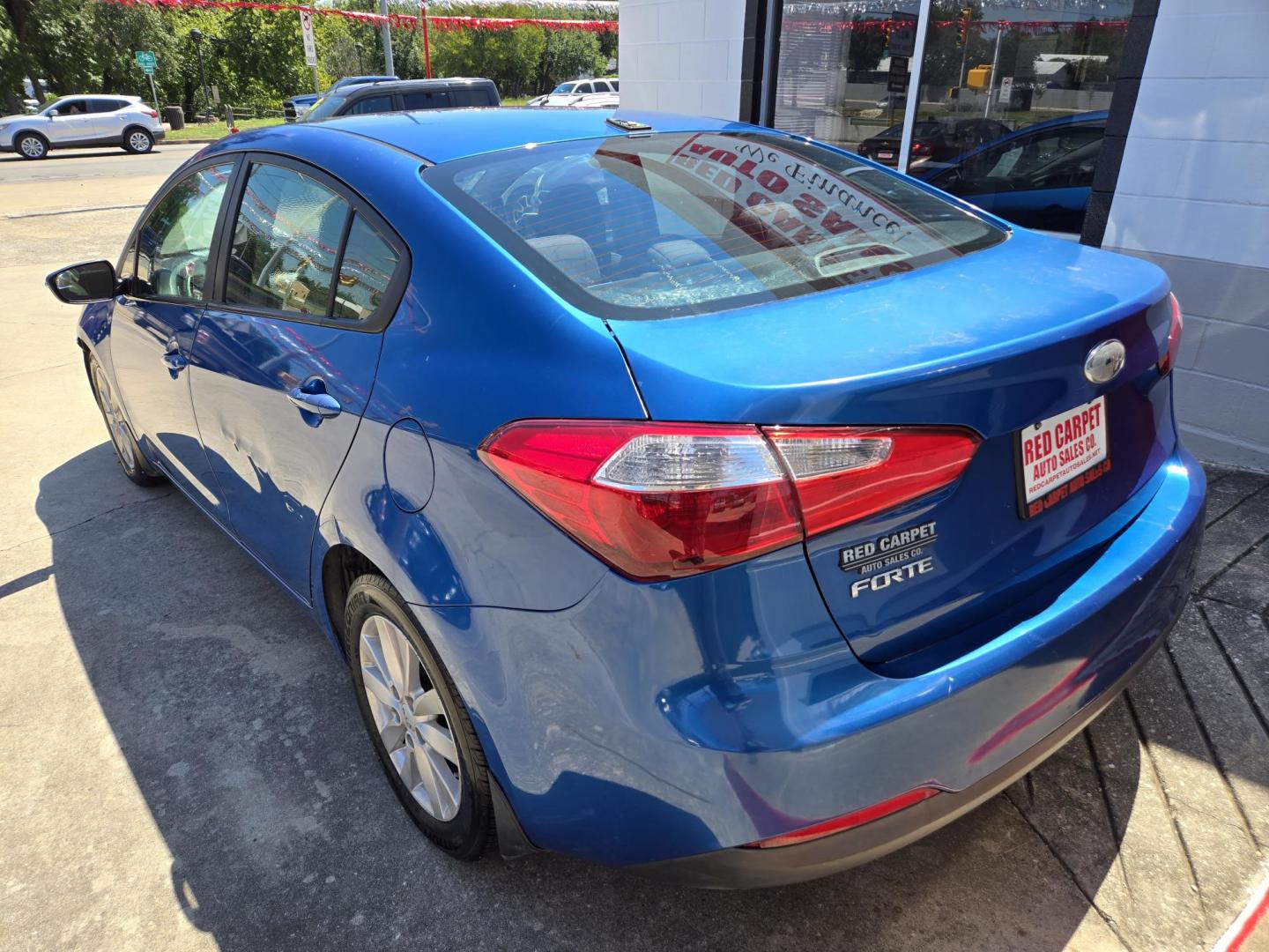 2014 Blue /Gray Kia Forte EX (KNAFX4A60E5) with an 1.8L L4 DOHC 16V engine, 6-Speed Automatic transmission, located at 503 West Court, Seguin, TX, 78155, (830) 379-3373, 29.568621, -97.969803 - Photo#2