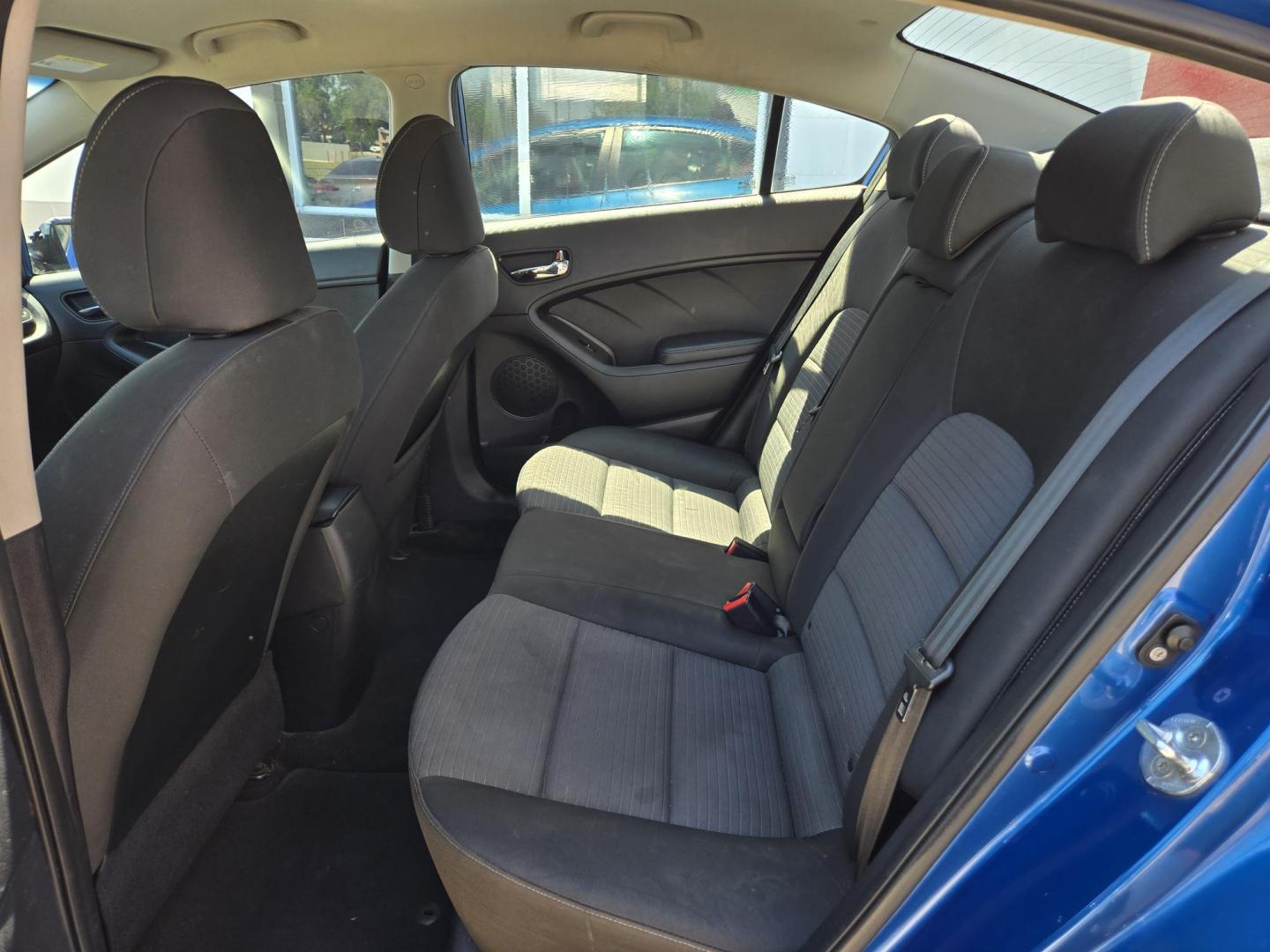2014 Blue /Gray Kia Forte EX (KNAFX4A60E5) with an 1.8L L4 DOHC 16V engine, 6-Speed Automatic transmission, located at 503 West Court, Seguin, TX, 78155, (830) 379-3373, 29.568621, -97.969803 - Photo#6