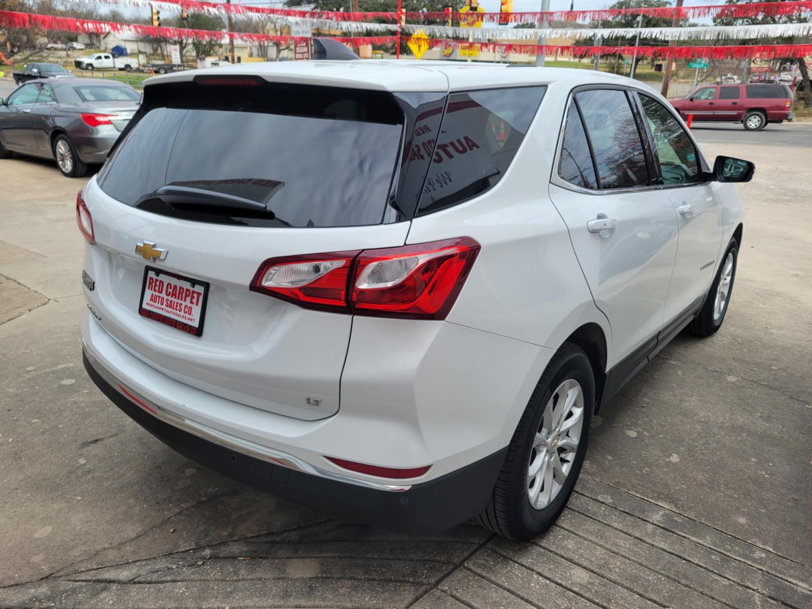 2019 WHITE /Black Chevrolet Equinox LT 2WD (2GNAXJEV3K6) with an 1.5L L4 DIR DOHC 16V TURBO engine, 6A transmission, located at 503 West Court, Seguin, TX, 78155, (830) 379-3373, 29.568621, -97.969803 - 2019 Chevrolet Equinox LT 2WD with a 1.5L L4 DIR DOHC 16V TURBO, Automatic, Tilt, Cruise, AM/FM Touchscreen Stereo, Power Windows, Locks, Seat and Side Mirrors, Bluetooth, Automatic Headlights, Dual Climate Control, Power Rear Hatch, Heated Seats, Tinted Windows, Alloy Wheels, Rear Wiper, Rear Defro - Photo #2