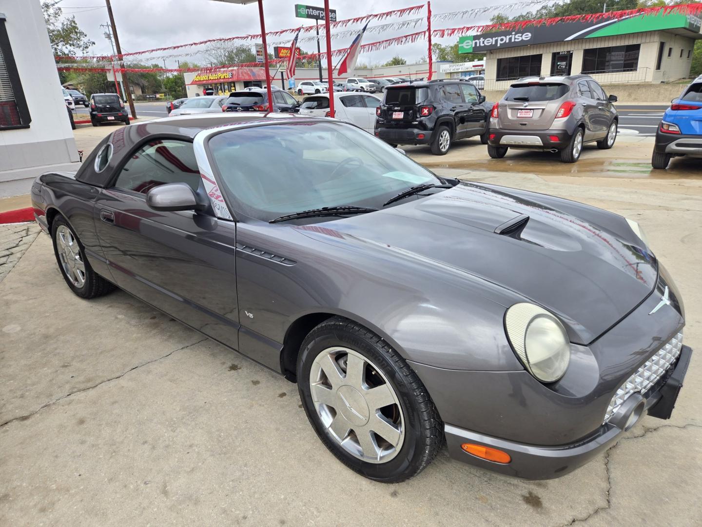 2003 Gray /Black Ford Thunderbird Deluxe (1FAHP60A13Y) with an 3.9L V8 DOHC 32V engine, 5-Speed Automatic Overdrive transmission, located at 503 West Court, Seguin, TX, 78155, (830) 379-3373, 29.568621, -97.969803 - 2003 Ford Thunderbird Deluxe with a 3.9L V8 DOHC 32V, Automatic, Tilt, Cruise, AM/FM/CD Stereo, Power Windows and Locks, Dual Climate Control, Power Convertible Top, Automatic Headlights, Removeable Hard Top and Hard Top Storage Cart, Alloy Wheels and more!!- Photo#1