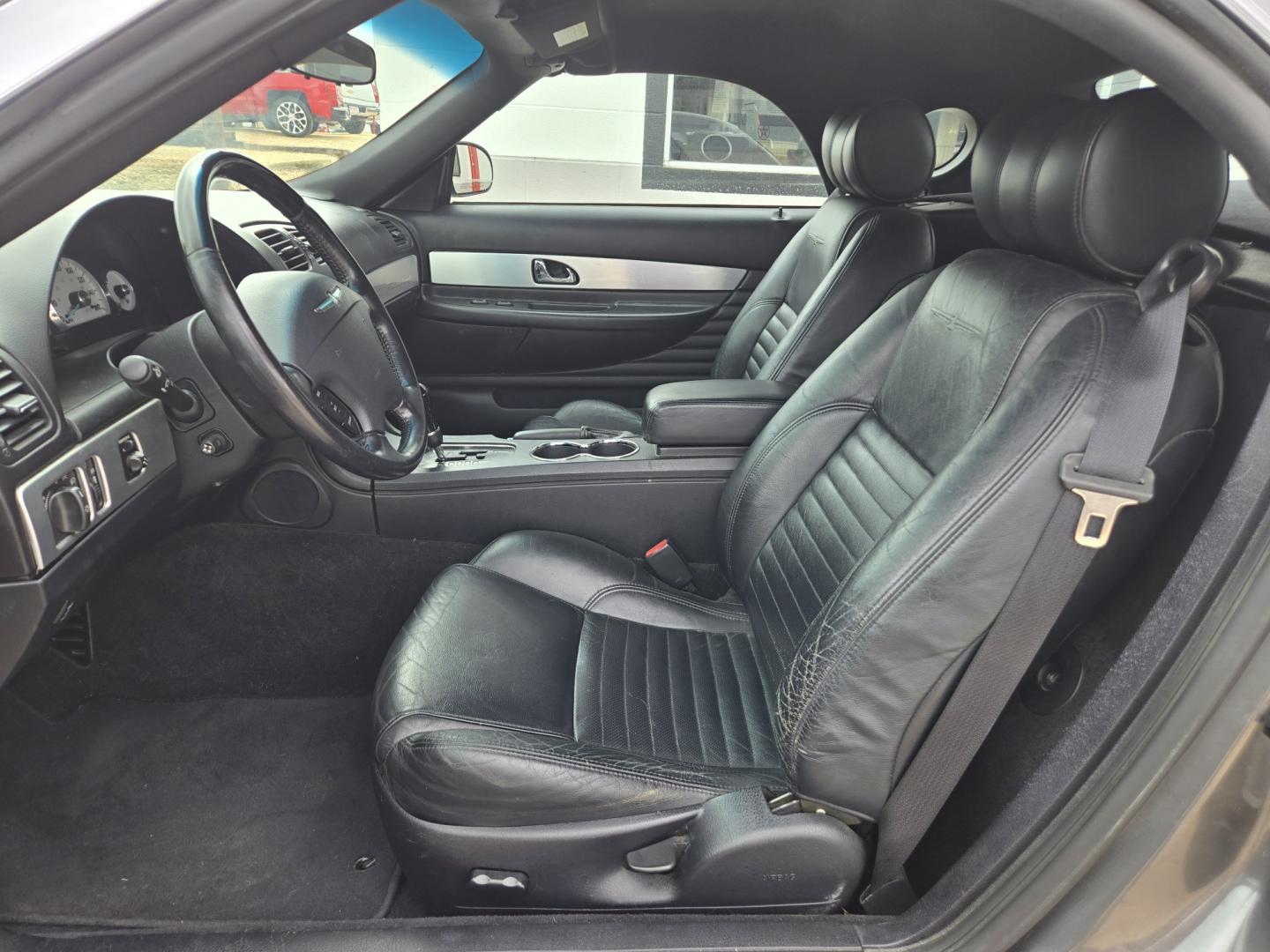2003 Gray /Black Ford Thunderbird Deluxe (1FAHP60A13Y) with an 3.9L V8 DOHC 32V engine, 5-Speed Automatic Overdrive transmission, located at 503 West Court, Seguin, TX, 78155, (830) 379-3373, 29.568621, -97.969803 - 2003 Ford Thunderbird Deluxe with a 3.9L V8 DOHC 32V, Automatic, Tilt, Cruise, AM/FM/CD Stereo, Power Windows and Locks, Dual Climate Control, Power Convertible Top, Automatic Headlights, Removeable Hard Top and Hard Top Storage Cart, Alloy Wheels and more!!- Photo#4