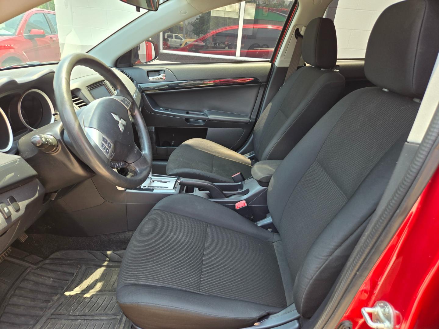 2017 Red /Black Mitsubishi Lancer ES 5M (JA32U2FU2HU) with an 2.0L L4 SOHC 16V engine, Automatic transmission, located at 503 West Court, Seguin, TX, 78155, (830) 379-3373, 29.568621, -97.969803 - Photo#4