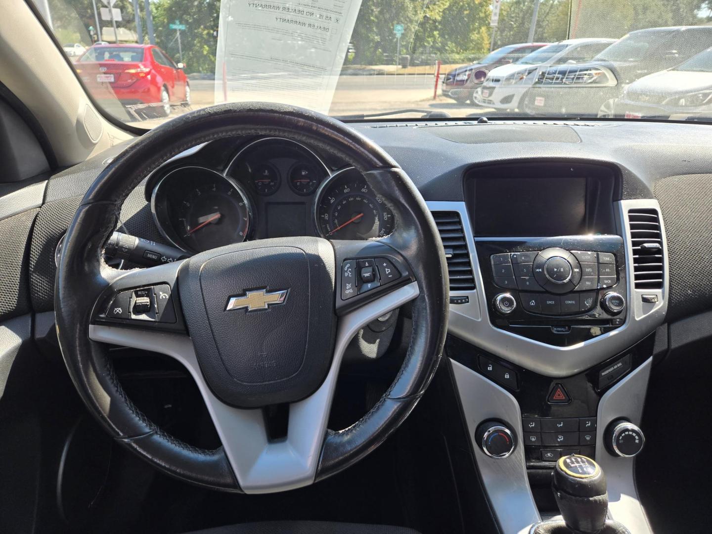2014 Blue /Black Chevrolet Cruze 1LT Manual (1G1PD5SB9E7) with an 1.4L L4 DOHC 16V TURBO engine, 6-Speed Manual transmission, located at 503 West Court, Seguin, TX, 78155, (830) 379-3373, 29.568621, -97.969803 - *Cash Special* 2014 Chevrolet Cruze 1LT Manual with a 1.4L L4 DOHC 16V TURBO, Standard Transmission, Tilt, Cruise, AM/FM/CD Touchscreen Stereo, Power Windows, Locks, Seat and Side Mirrors, Bluetooth, Onstar Capability, Tinted Windows, Backup Camera, Alloy Wheels, Rear Defroster and more!! - Photo#5