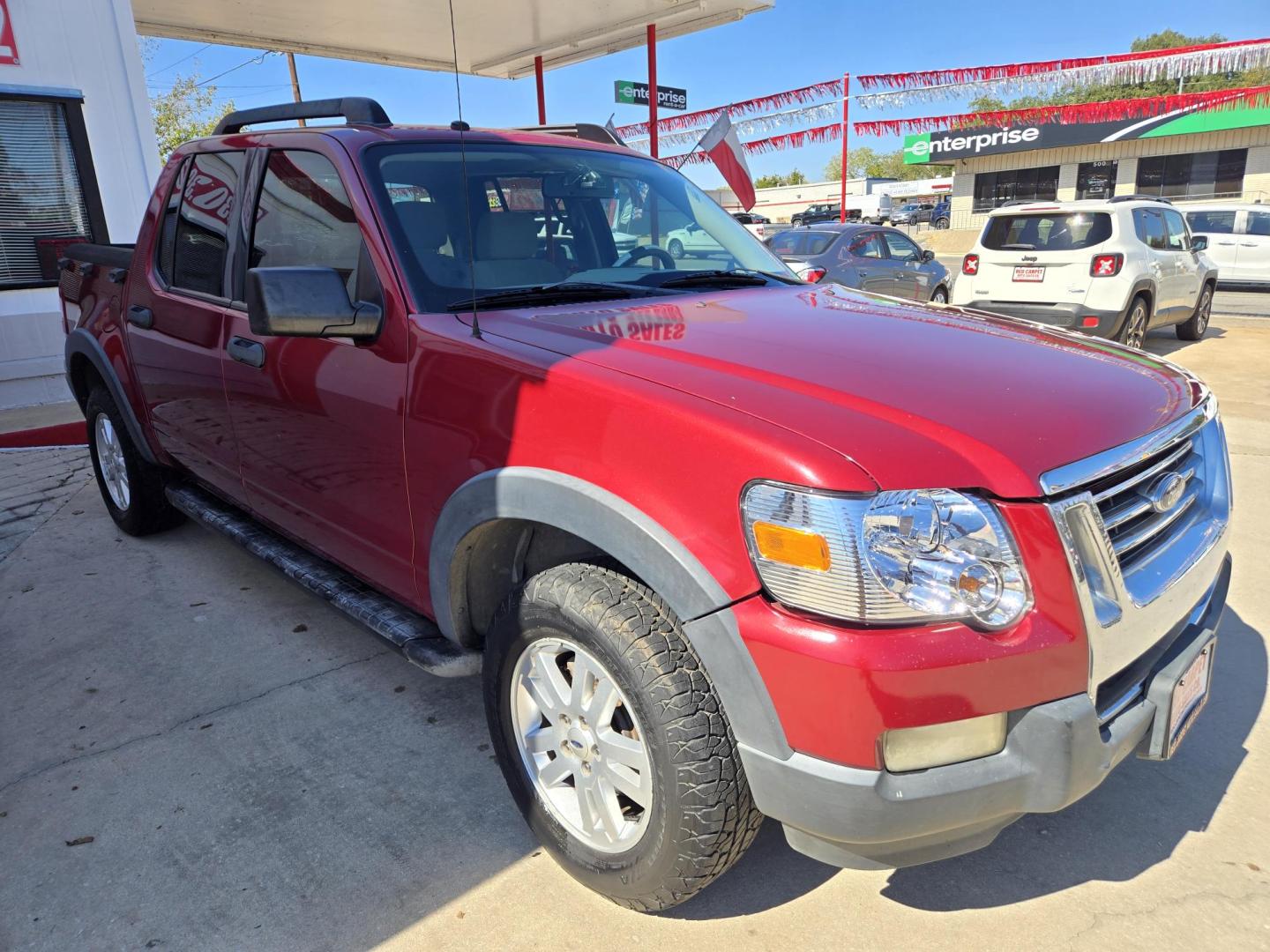2007 Red /GRAY Ford Explorer Sport Trac XLT 4.0L 2WD (1FMEU31K57U) with an 4.0L V6 SOHC 12V FFV engine, 5-Speed Automatic Overdrive transmission, located at 503 West Court, Seguin, TX, 78155, (830) 379-3373, 29.568621, -97.969803 - 2007 Ford Explorer Sport Trac XLT 2WD with a 4.0L V6 SOHC 12V FFV, Automatic, Tilt, Cruise, AM/FM Touchscreen Stereo, Power Windows, Locks and Side Mirrors, Bluetooth, Automatic Headlights, Tinted Windows, Running Boards, Alloy Wheels, Towing and more!! - Photo#1