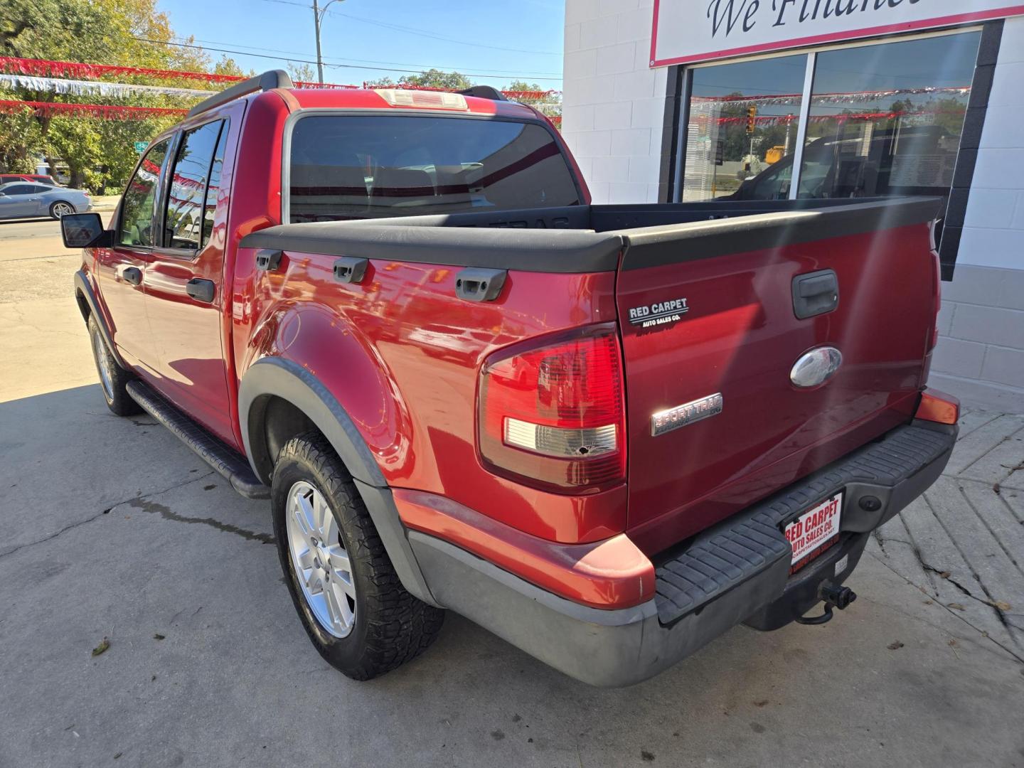 2007 Red /GRAY Ford Explorer Sport Trac XLT 4.0L 2WD (1FMEU31K57U) with an 4.0L V6 SOHC 12V FFV engine, 5-Speed Automatic Overdrive transmission, located at 503 West Court, Seguin, TX, 78155, (830) 379-3373, 29.568621, -97.969803 - 2007 Ford Explorer Sport Trac XLT 2WD with a 4.0L V6 SOHC 12V FFV, Automatic, Tilt, Cruise, AM/FM Touchscreen Stereo, Power Windows, Locks and Side Mirrors, Bluetooth, Automatic Headlights, Tinted Windows, Running Boards, Alloy Wheels, Towing and more!! - Photo#3