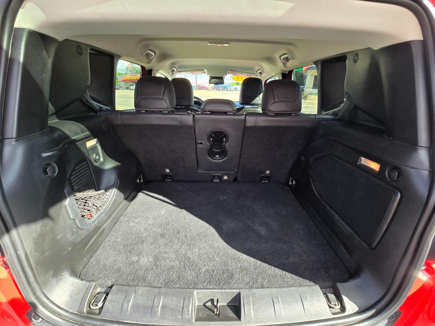 2015 Red /BLACK Jeep Renegade Limited FWD (ZACCJADT6FP) with an 2.4L L4 engine, 9-Speed Automatic transmission, located at 503 West Court, Seguin, TX, 78155, (830) 379-3373, 29.568621, -97.969803 - Photo#7