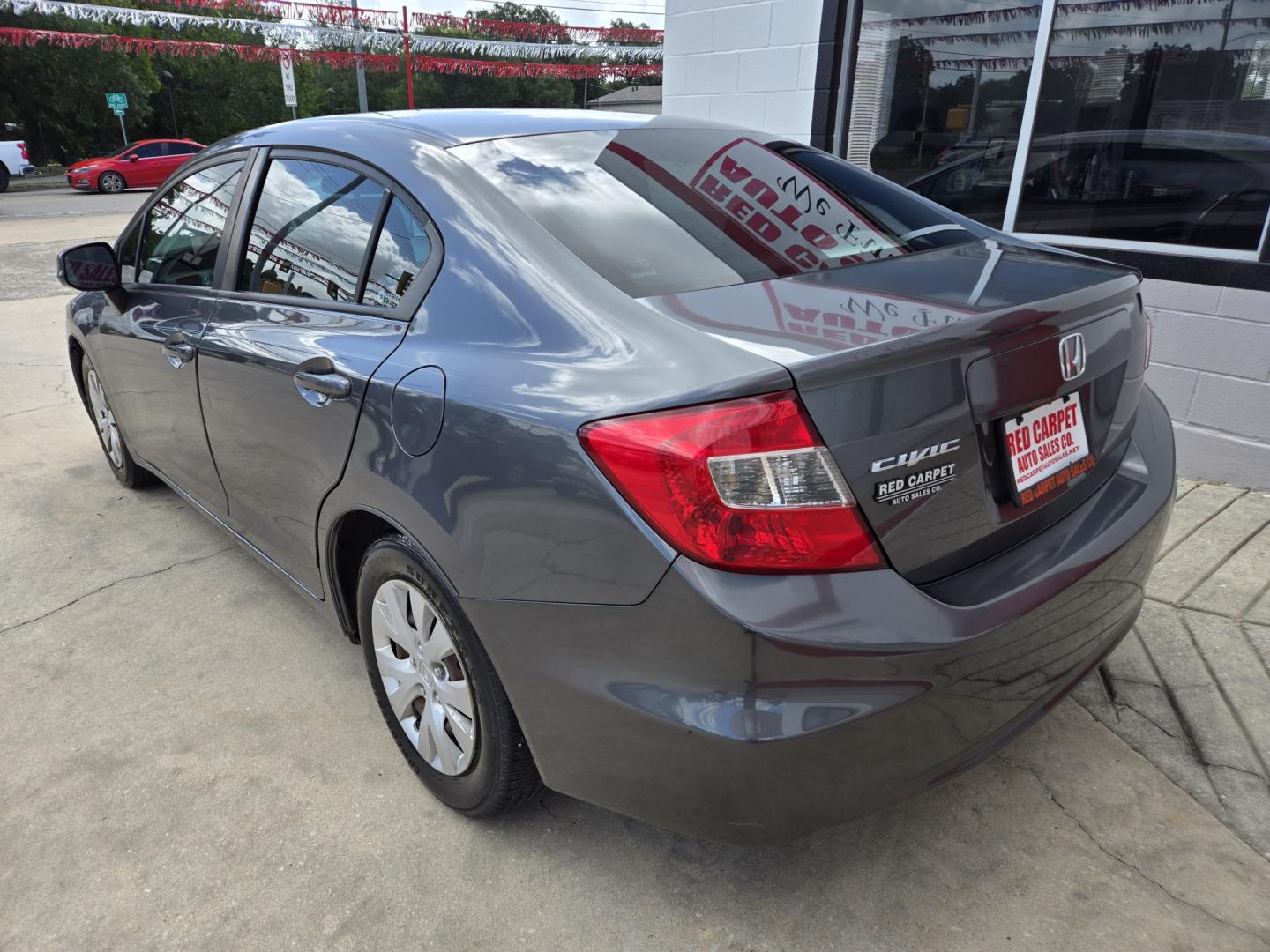 2012 GRAY Honda Civic (2HGFB2F58CH) with an 1.8L I4 F SOHC 16V engine, Automatic transmission, located at 503 West Court, Seguin, TX, 78155, (830) 379-3373, 29.568621, -97.969803 - 2012 Honda Civic LX Sedan with a 1.8L I4 F SOHC 16V, Automatic, Tilt, Cruise, AM/FM/CD/AUX Stereo, Power Windows, Locks and Side Mirrors, Tinted Windows, Rear Defroster and more!!- Photo#3