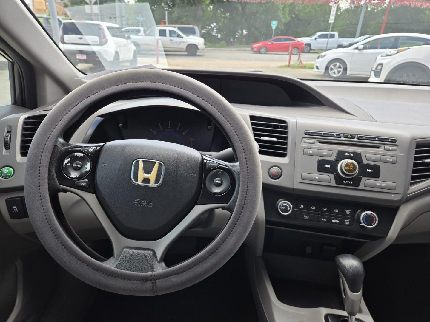 2012 GRAY Honda Civic (2HGFB2F58CH) with an 1.8L I4 F SOHC 16V engine, Automatic transmission, located at 503 West Court, Seguin, TX, 78155, (830) 379-3373, 29.568621, -97.969803 - 2012 Honda Civic LX Sedan with a 1.8L I4 F SOHC 16V, Automatic, Tilt, Cruise, AM/FM/CD/AUX Stereo, Power Windows, Locks and Side Mirrors, Tinted Windows, Rear Defroster and more!!- Photo#5