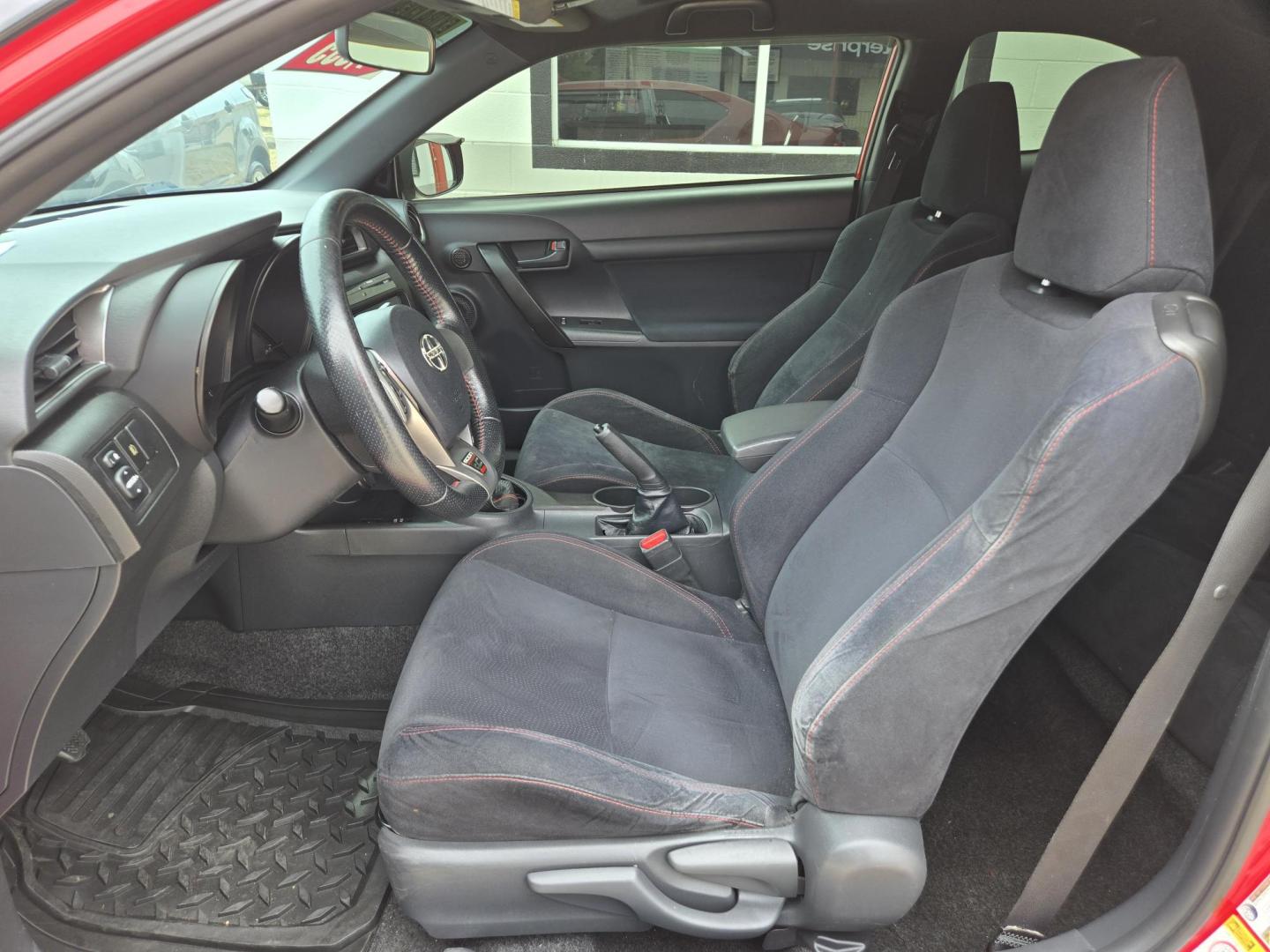 2013 Red Scion tC Sports Coupe 6-Spd AT (JTKJF5C74D3) with an 2.4L L4 DOHC 16V engine, Manual Transmission transmission, located at 503 West Court, Seguin, TX, 78155, (830) 379-3373, 29.568621, -97.969803 - Photo#4