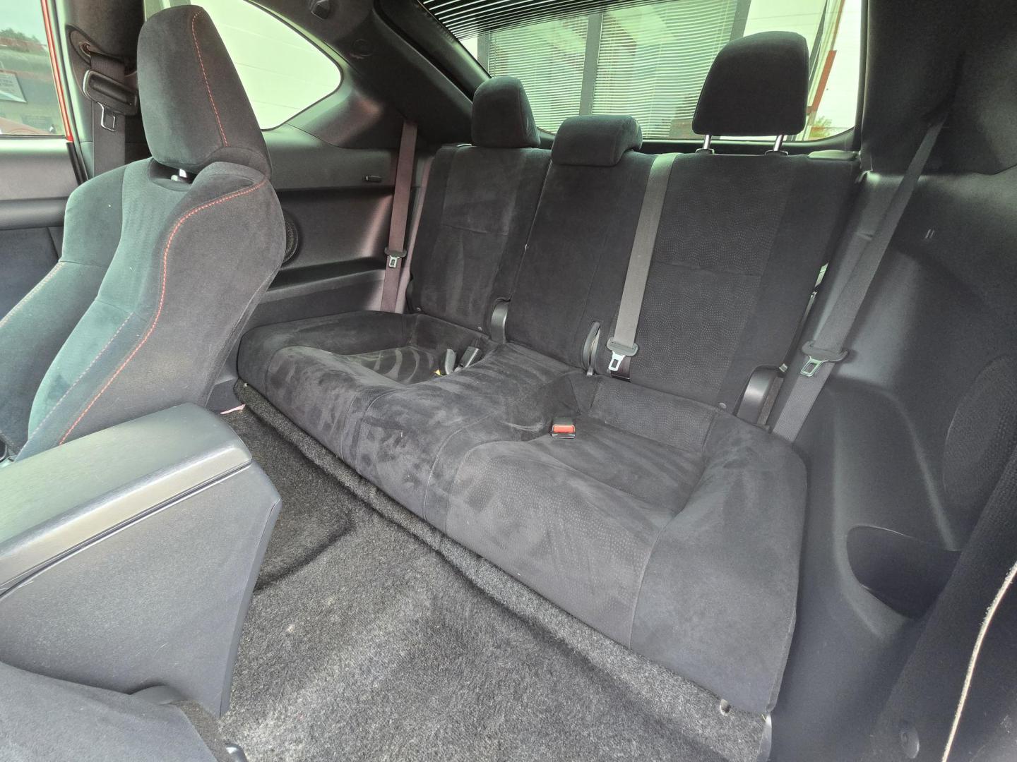 2013 Red Scion tC Sports Coupe 6-Spd AT (JTKJF5C74D3) with an 2.4L L4 DOHC 16V engine, Manual Transmission transmission, located at 503 West Court, Seguin, TX, 78155, (830) 379-3373, 29.568621, -97.969803 - Photo#6