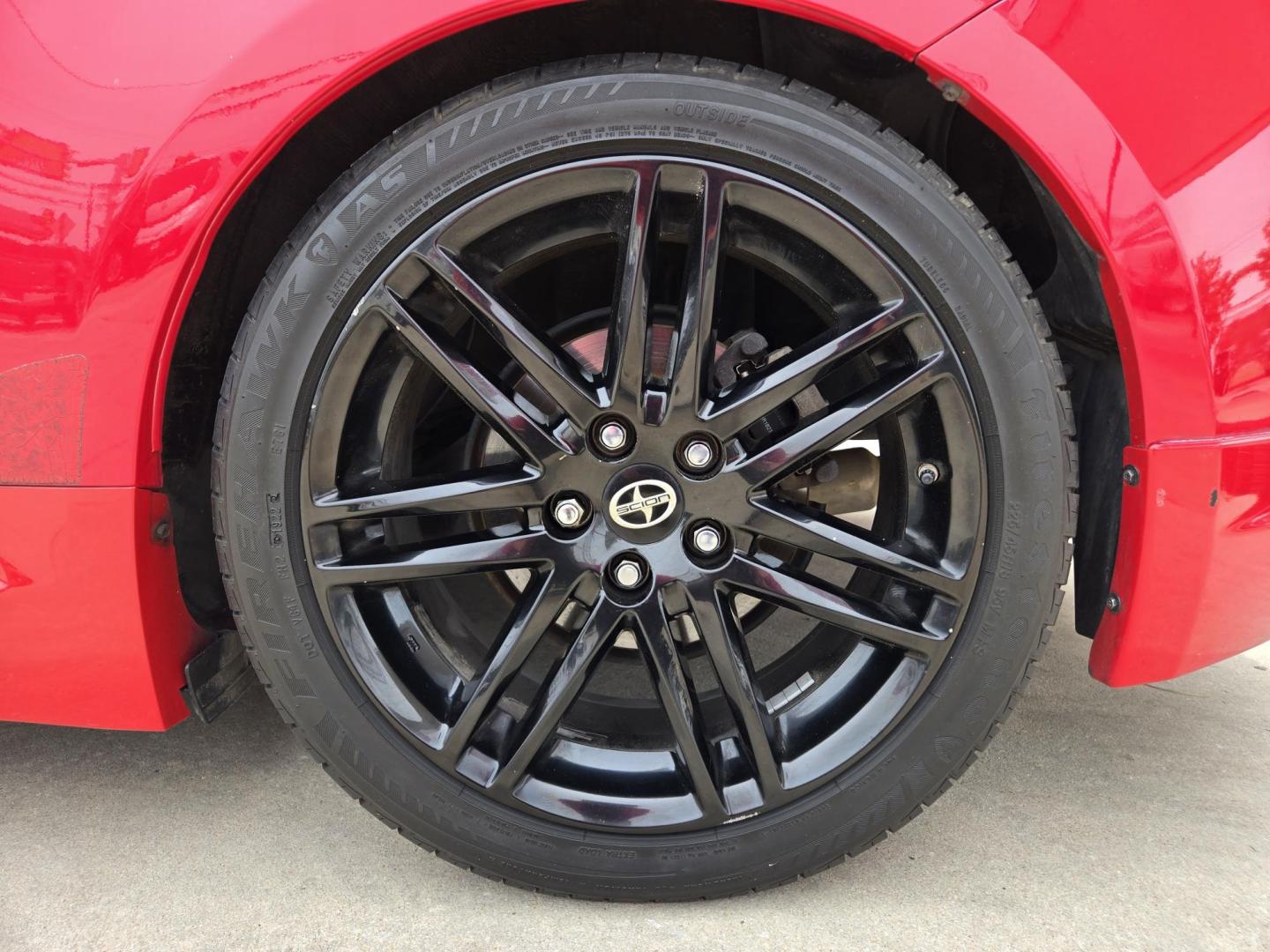 2013 Red Scion tC Sports Coupe 6-Spd AT (JTKJF5C74D3) with an 2.4L L4 DOHC 16V engine, Manual Transmission transmission, located at 503 West Court, Seguin, TX, 78155, (830) 379-3373, 29.568621, -97.969803 - Photo#7