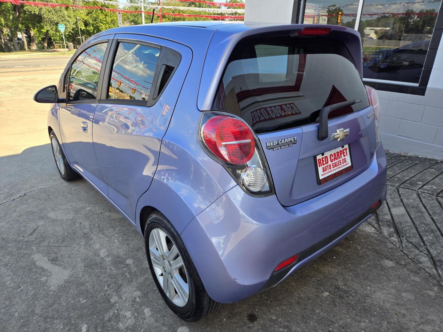 2015 Purple Chevrolet Spark LS Manual (KL8CA6S93FC) with an 1.2L L4 16V DOHC engine, 5-Speed Manual transmission, located at 503 West Court, Seguin, TX, 78155, (830) 379-3373, 29.568621, -97.969803 - Photo#3