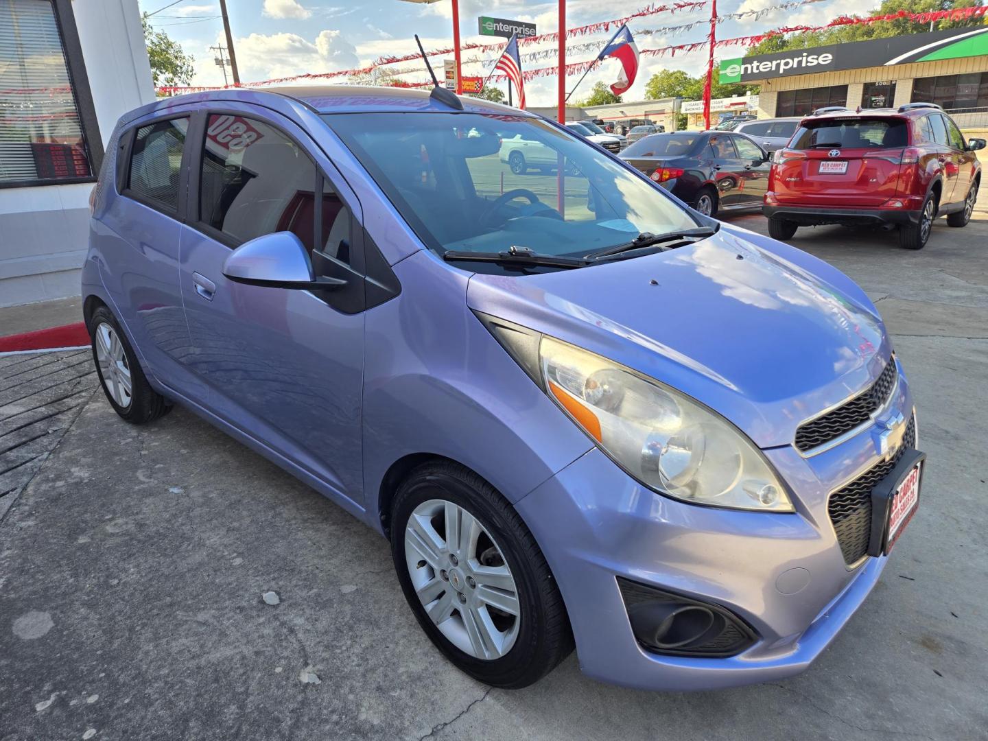2015 Purple Chevrolet Spark LS Manual (KL8CA6S93FC) with an 1.2L L4 16V DOHC engine, 5-Speed Manual transmission, located at 503 West Court, Seguin, TX, 78155, (830) 379-3373, 29.568621, -97.969803 - Photo#1