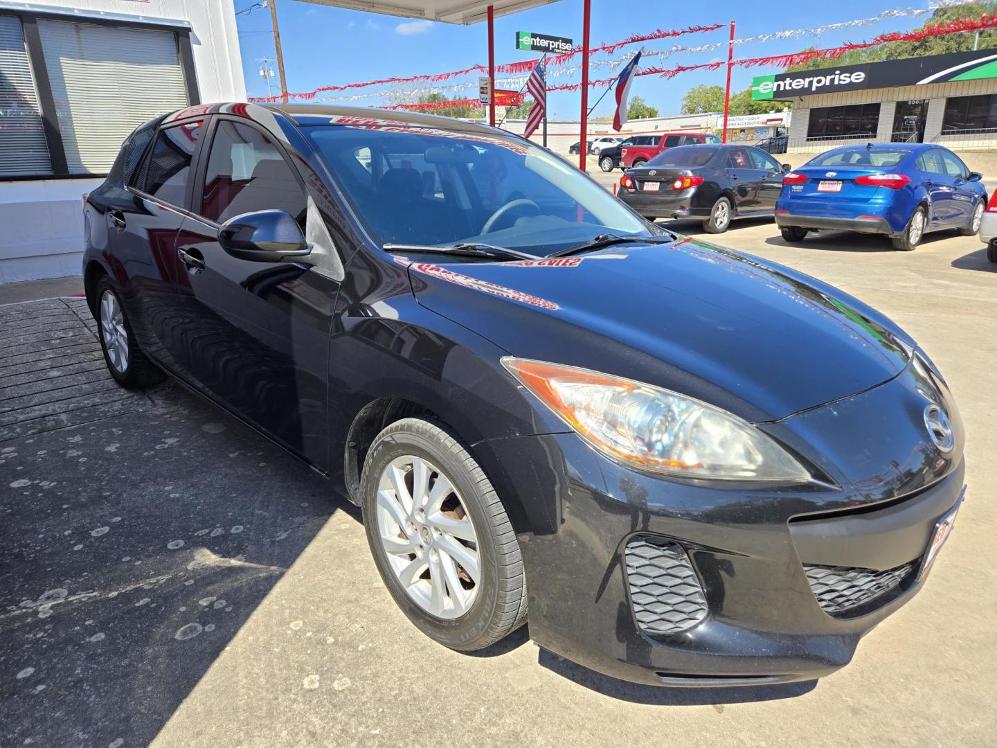 2012 Black Mazda MAZDA3 I Touring 5-Door (JM1BL1L88C1) with an 2.0L L4 DOHC 16V engine, Automatic transmission, located at 503 West Court, Seguin, TX, 78155, (830) 379-3373, 29.568621, -97.969803 - Photo#1