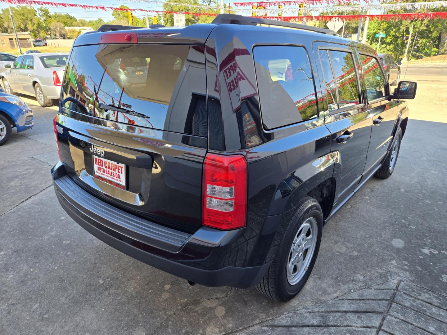 2017 Black Jeep Patriot Sport 2WD (1C4NJPBB9HD) with an 2.4L L4 DOHC 16V engine, Automatic transmission, located at 503 West Court, Seguin, TX, 78155, (830) 379-3373, 29.568621, -97.969803 - Photo#2