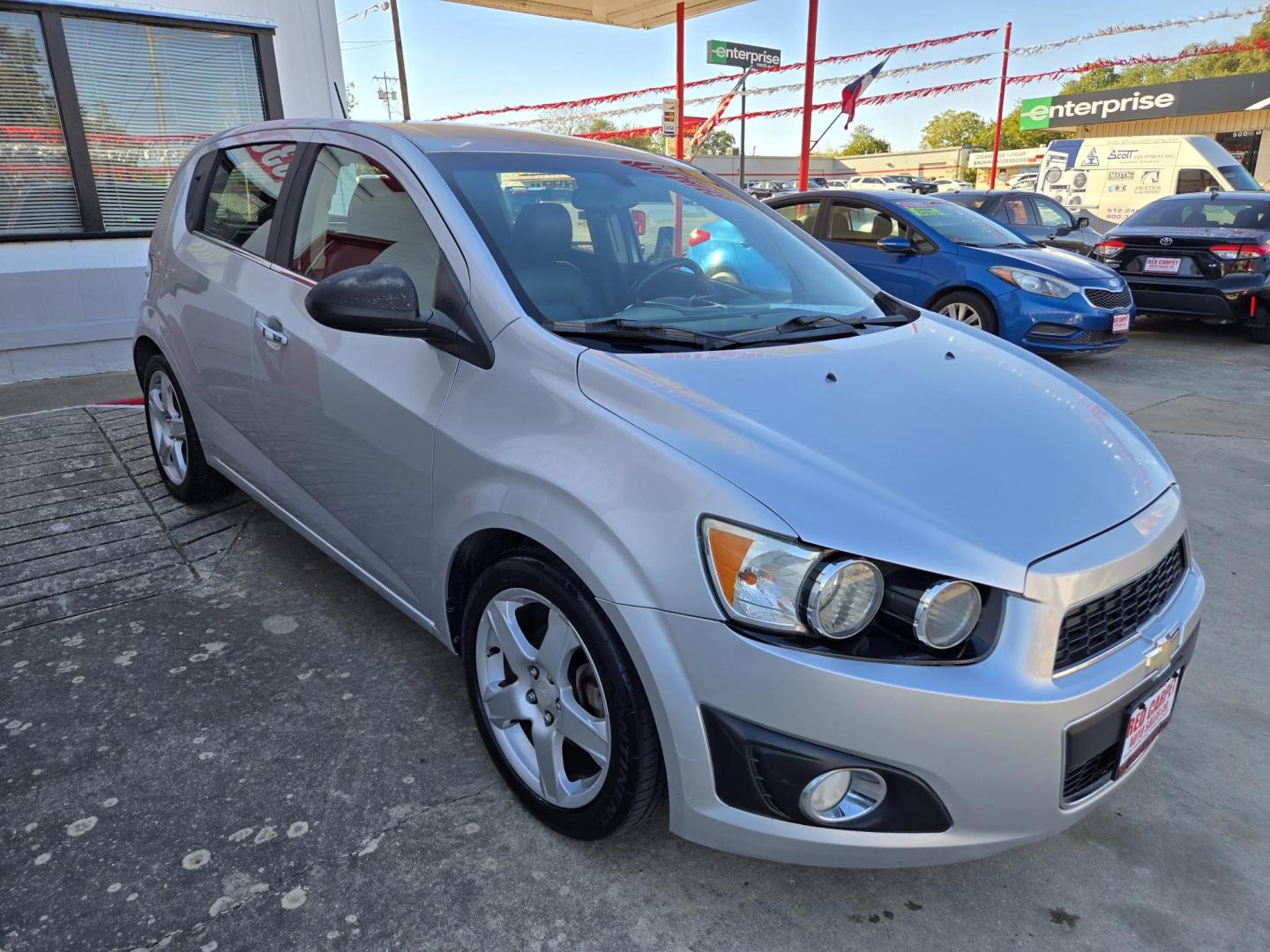 2016 Chevrolet Sonic LTZ Auto 5-Door (1G1JE6SB9G4) with an 1.4L L4 DOHC 24V TURBO engine, 6A transmission, located at 503 West Court, Seguin, TX, 78155, (830) 379-3373, 29.568621, -97.969803 - 2016 Chevrolet Sonic LTZ Auto 5-Door with a 1.4L L4 DOHC 24V TURBO, Automatic, Tilt, Cruise, AM/FM Touchscreen Stereo, Power Windows, Locks and Side Mirrors, Bluetooth, Onstar Capability, Alloy Wheels, Automatic Headlights, Rear Wiper, Rear Defroster and more!! - Photo#1
