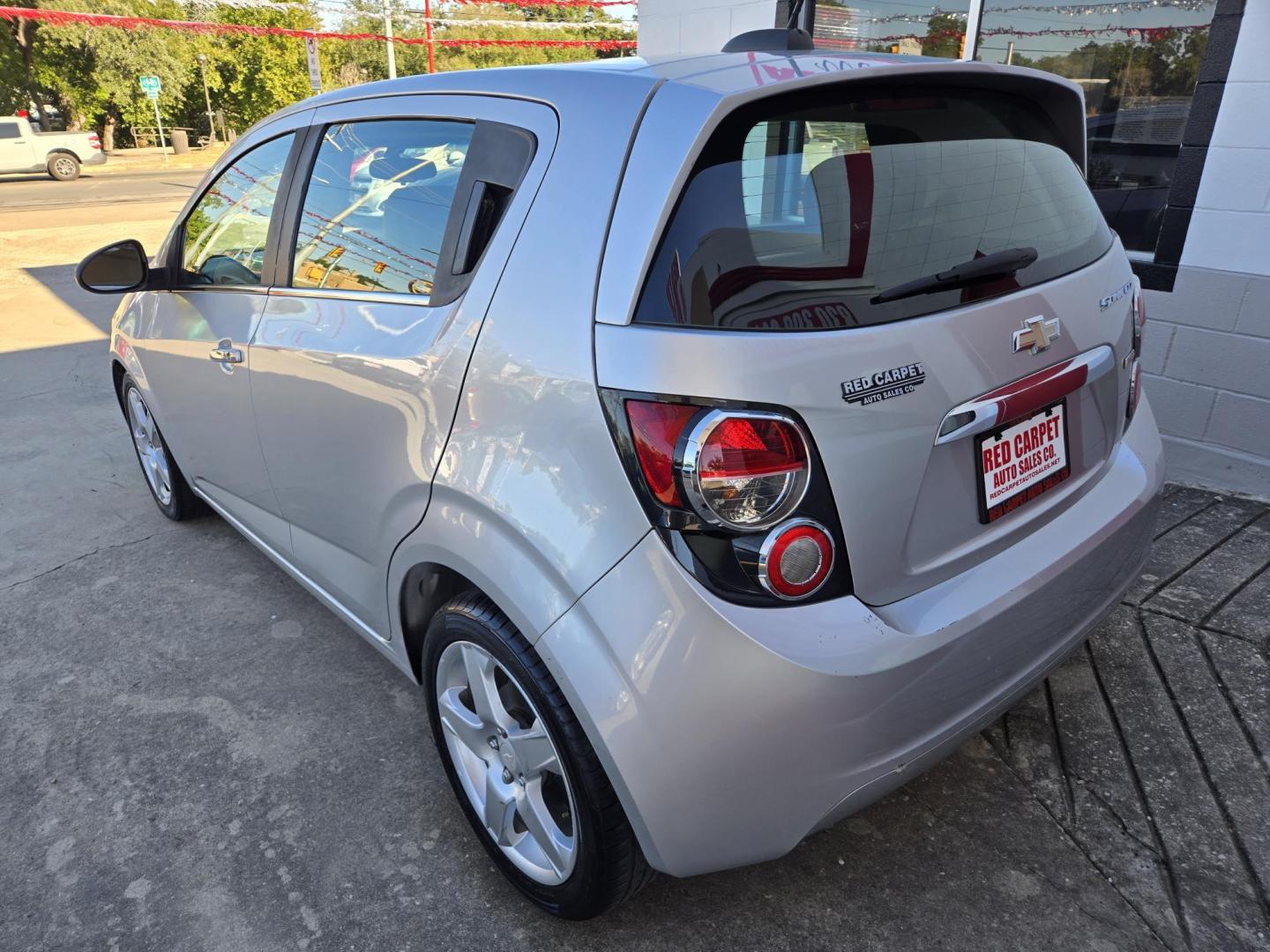 2016 Chevrolet Sonic LTZ Auto 5-Door (1G1JE6SB9G4) with an 1.4L L4 DOHC 24V TURBO engine, 6A transmission, located at 503 West Court, Seguin, TX, 78155, (830) 379-3373, 29.568621, -97.969803 - 2016 Chevrolet Sonic LTZ Auto 5-Door with a 1.4L L4 DOHC 24V TURBO, Automatic, Tilt, Cruise, AM/FM Touchscreen Stereo, Power Windows, Locks and Side Mirrors, Bluetooth, Onstar Capability, Alloy Wheels, Automatic Headlights, Rear Wiper, Rear Defroster and more!! - Photo#3