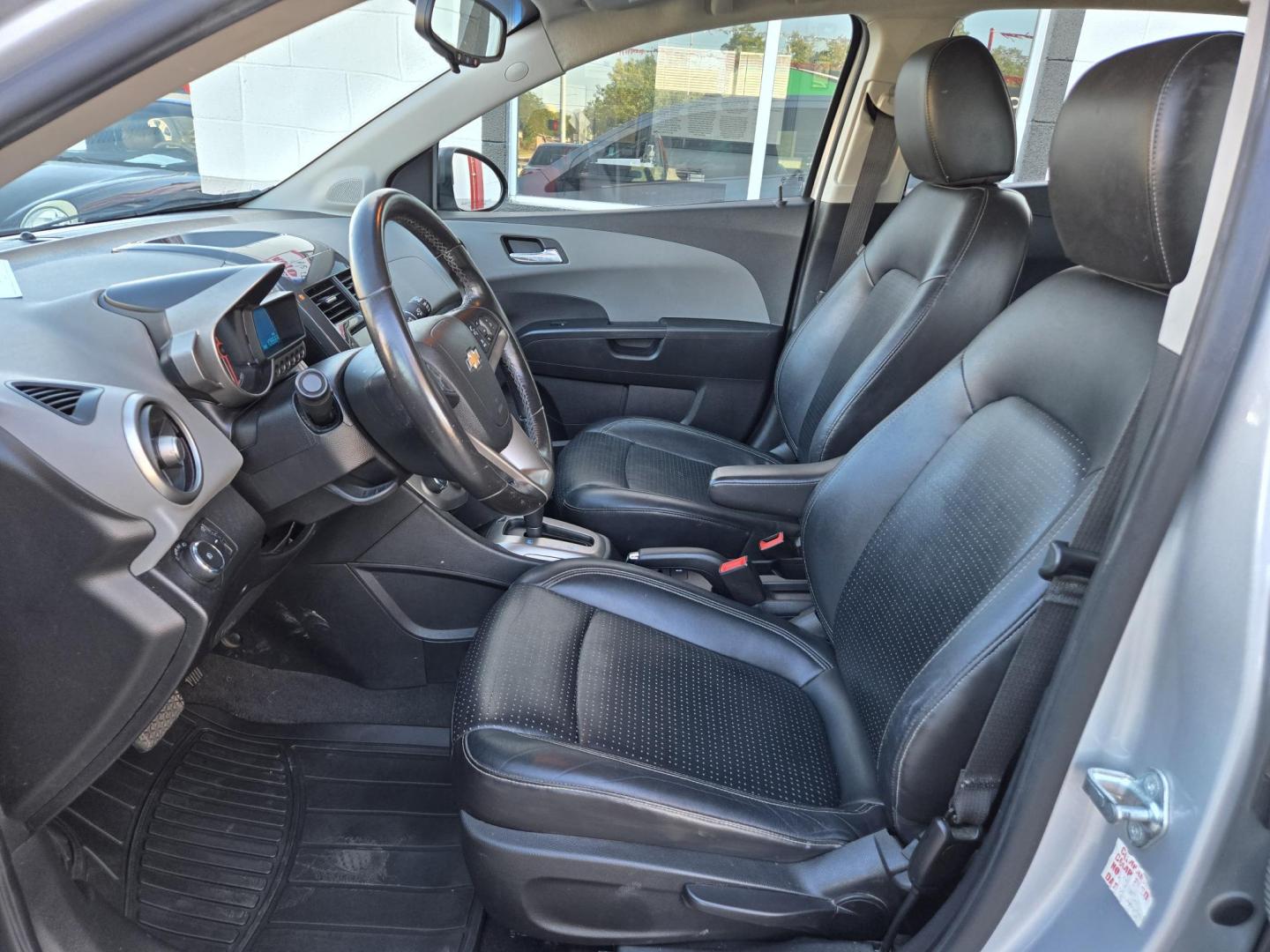 2016 Chevrolet Sonic LTZ Auto 5-Door (1G1JE6SB9G4) with an 1.4L L4 DOHC 24V TURBO engine, 6A transmission, located at 503 West Court, Seguin, TX, 78155, (830) 379-3373, 29.568621, -97.969803 - 2016 Chevrolet Sonic LTZ Auto 5-Door with a 1.4L L4 DOHC 24V TURBO, Automatic, Tilt, Cruise, AM/FM Touchscreen Stereo, Power Windows, Locks and Side Mirrors, Bluetooth, Onstar Capability, Alloy Wheels, Automatic Headlights, Rear Wiper, Rear Defroster and more!! - Photo#4