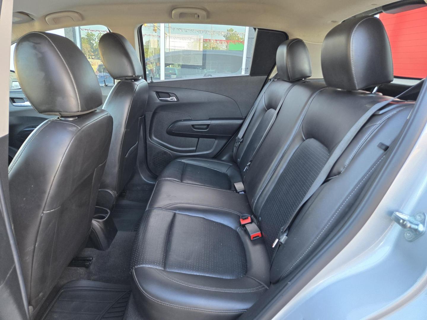 2016 Chevrolet Sonic LTZ Auto 5-Door (1G1JE6SB9G4) with an 1.4L L4 DOHC 24V TURBO engine, 6A transmission, located at 503 West Court, Seguin, TX, 78155, (830) 379-3373, 29.568621, -97.969803 - 2016 Chevrolet Sonic LTZ Auto 5-Door with a 1.4L L4 DOHC 24V TURBO, Automatic, Tilt, Cruise, AM/FM Touchscreen Stereo, Power Windows, Locks and Side Mirrors, Bluetooth, Onstar Capability, Alloy Wheels, Automatic Headlights, Rear Wiper, Rear Defroster and more!! - Photo#6