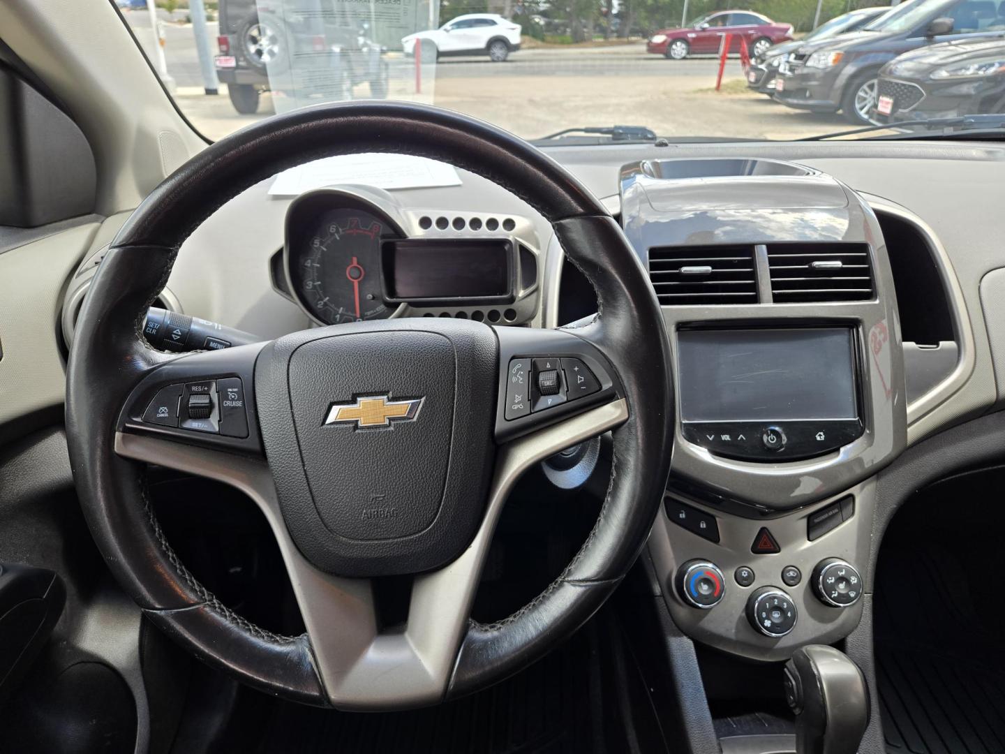 2016 SILVER Chevrolet Sonic LTZ Auto 5-Door (1G1JE6SB9G4) with an 1.4L L4 DOHC 24V TURBO engine, 6A transmission, located at 503 West Court, Seguin, TX, 78155, (830) 379-3373, 29.568621, -97.969803 - *Cash Special* 2016 Chevrolet Sonic LTZ Auto 5-Door with a 1.4L L4 DOHC 24V TURBO, Automatic, Tilt, Cruise, AM/FM Touchscreen Stereo, Power Windows, Locks and Side Mirrors, Bluetooth, Onstar Capability, Alloy Wheels, Automatic Headlights, Rear Wiper, Rear Defroster and more!! - Photo#5