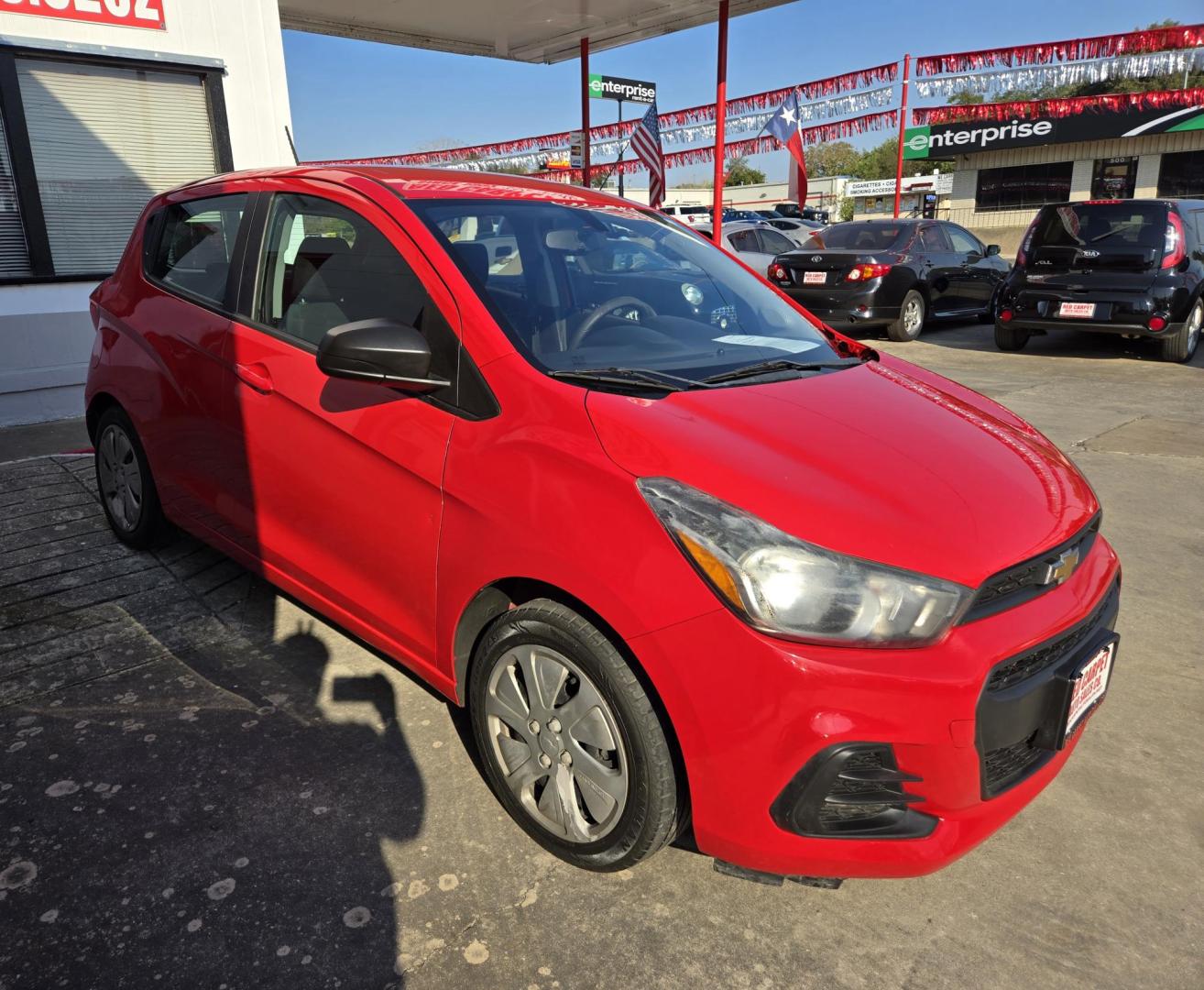 2018 Red Chevrolet Spark LS (KL8CB6SA9JC) with an 1.4L L4 16V DOHC engine, Automatic transmission, located at 503 West Court, Seguin, TX, 78155, (830) 379-3373, 29.568621, -97.969803 - 2018 Chevrolet Spark LS with a 1.4L L4 16V DOHC, Automatic, Tilt, Cruise, AM/FM/AUX Touchscreen Stereo, Automatic Headlights, Onstar Capability, Backup Camera, Rear Wiper, Rear Defroster and more!! - Photo#1