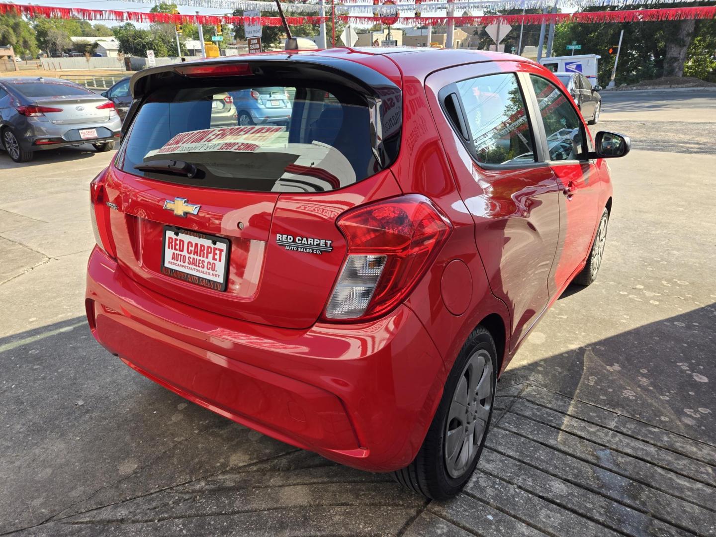 2018 Red Chevrolet Spark LS (KL8CB6SA9JC) with an 1.4L L4 16V DOHC engine, Automatic transmission, located at 503 West Court, Seguin, TX, 78155, (830) 379-3373, 29.568621, -97.969803 - 2018 Chevrolet Spark LS with a 1.4L L4 16V DOHC, Automatic, Tilt, Cruise, AM/FM/AUX Touchscreen Stereo, Automatic Headlights, Onstar Capability, Backup Camera, Rear Wiper, Rear Defroster and more!! - Photo#2