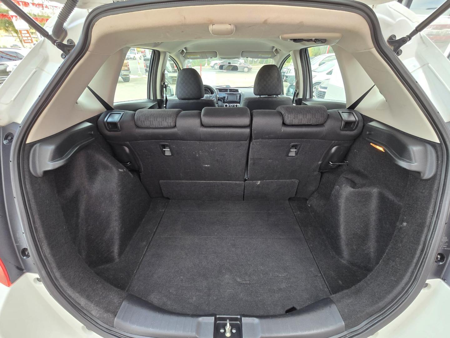 2015 WHITE Honda Fit LX CVT (3HGGK5H54FM) with an 1.5L L4 SOHC 16V engine, Automatic transmission, located at 503 West Court, Seguin, TX, 78155, (830) 379-3373, 29.568621, -97.969803 - Photo#6