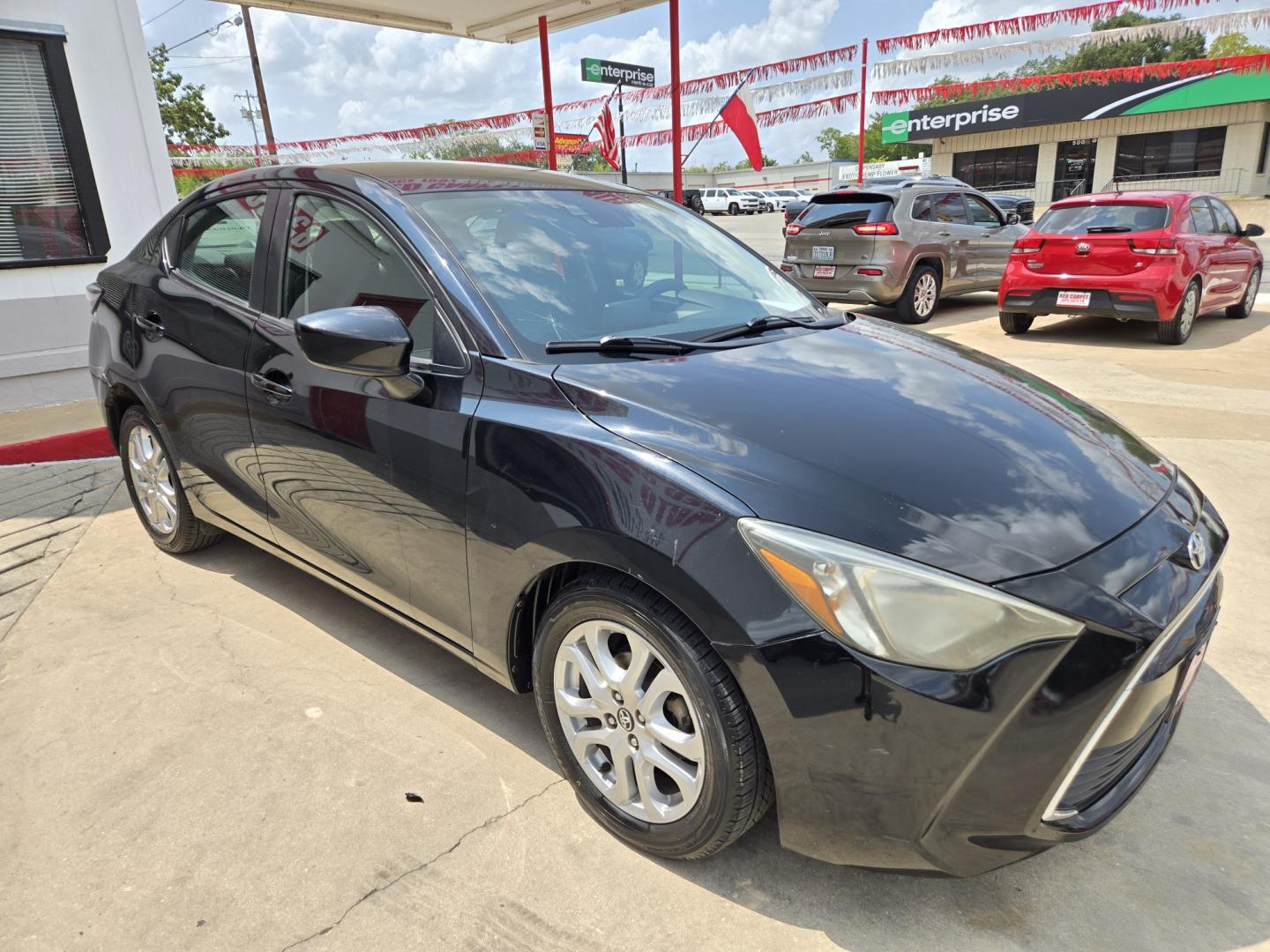 2018 Black Toyota Yaris iA 6A (3MYDLBYV8JY) with an 1.5L L4 DOHC 16V engine, Automatic transmission, located at 503 West Court, Seguin, TX, 78155, (830) 379-3373, 29.568621, -97.969803 - 2018 Toyota Yaris iA with a 1.5L L4 DOHC 16V, Automatic, Tilt, Cruise, AM/FM/AUX Stereo, Power Windows, Locks and Side Mirrors, Bluetooth, Backup Camera, Alloy Wheels, Rear Defroster and more!!- Photo#1