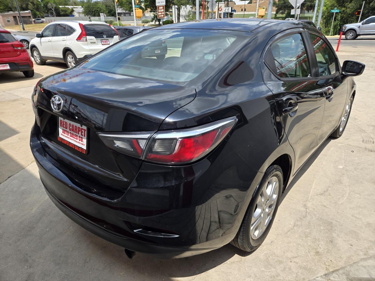 2018 Black Toyota Yaris iA 6A (3MYDLBYV8JY) with an 1.5L L4 DOHC 16V engine, Automatic transmission, located at 503 West Court, Seguin, TX, 78155, (830) 379-3373, 29.568621, -97.969803 - 2018 Toyota Yaris iA with a 1.5L L4 DOHC 16V, Automatic, Tilt, Cruise, AM/FM/AUX Stereo, Power Windows, Locks and Side Mirrors, Bluetooth, Backup Camera, Alloy Wheels, Rear Defroster and more!!- Photo#2