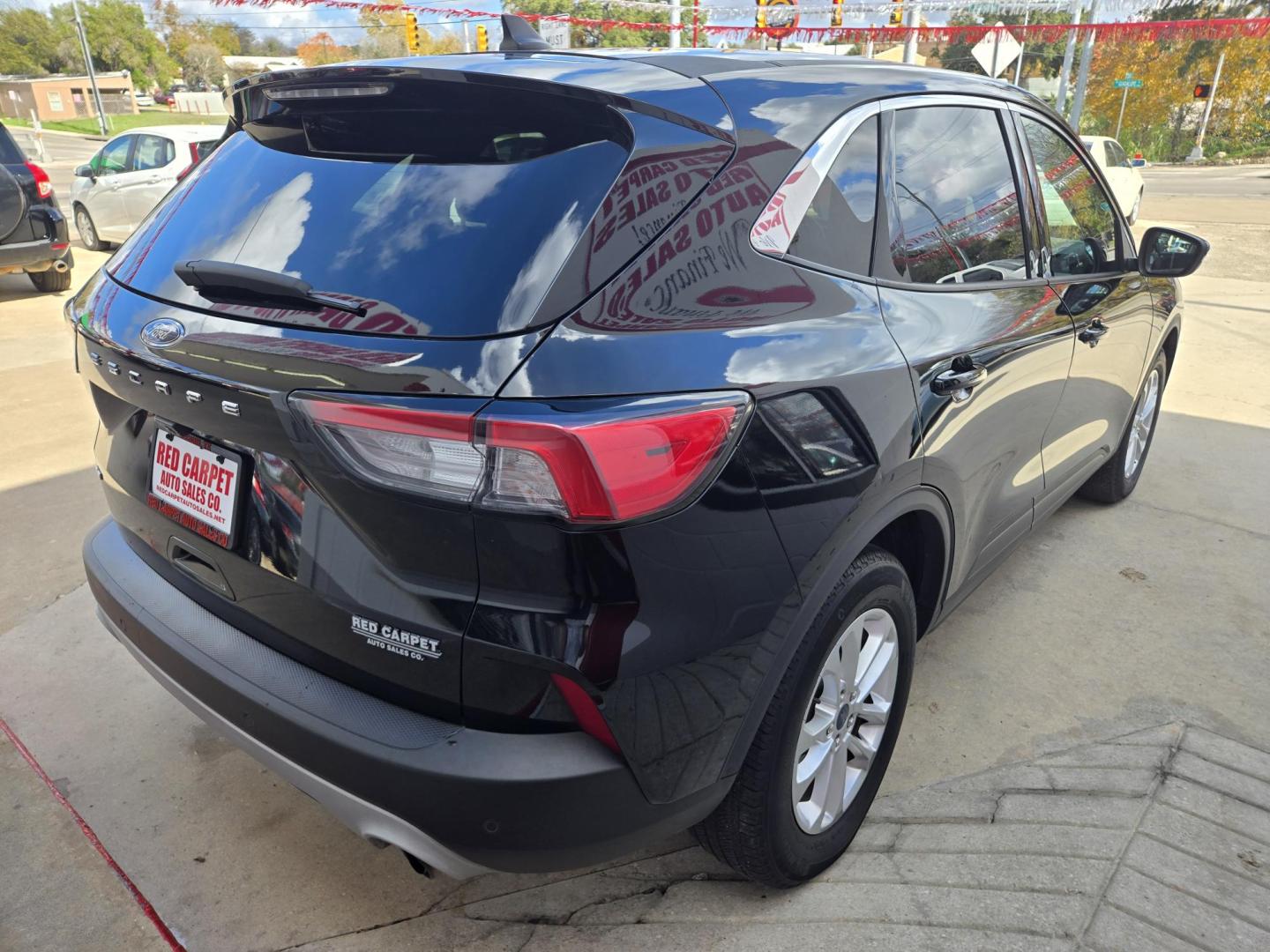 2021 Black Ford Escape SE (1FMCU0G64MU) with an 1.5L L3 engine, 6A transmission, located at 503 West Court, Seguin, TX, 78155, (830) 379-3373, 29.568621, -97.969803 - 2021 Ford Escape SE with a 1.5L L3, Automatic, Tilt, Cruise, AM/FM Touchscreen Stereo, Power Windows, Locks and Side Mirrors, Bluetooth, Tinted Windows, Alloy Wheels, Backup Camera, Bumper Sensors, Rear Defroster, Rear Wiper and more!! - Photo#2