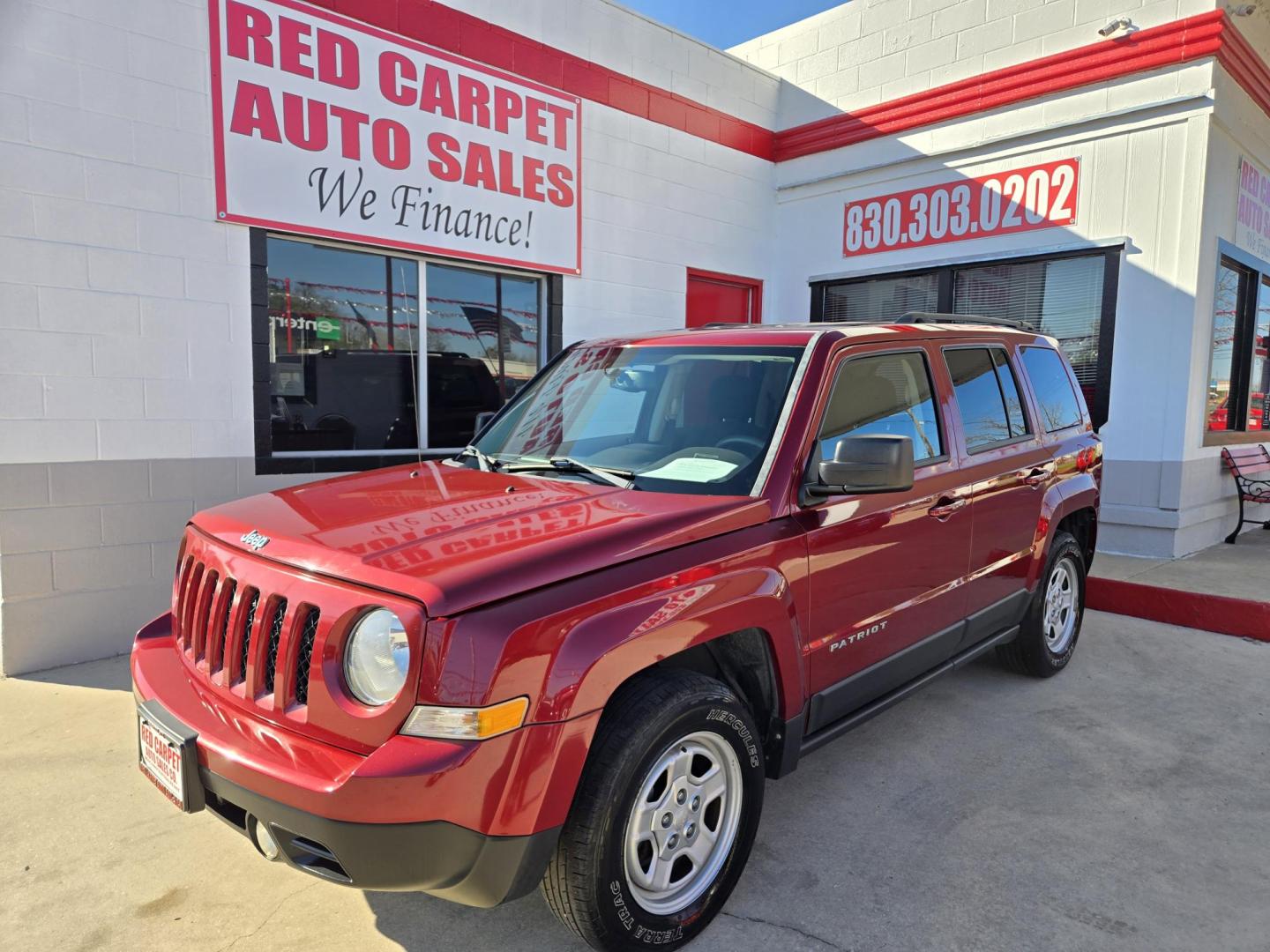 2015 Red Jeep Patriot Sport 2WD (1C4NJPBB7FD) with an 2.4L L4 DOHC 16V engine, Automatic transmission, located at 503 West Court, Seguin, TX, 78155, (830) 379-3373, 29.568621, -97.969803 - Photo#0