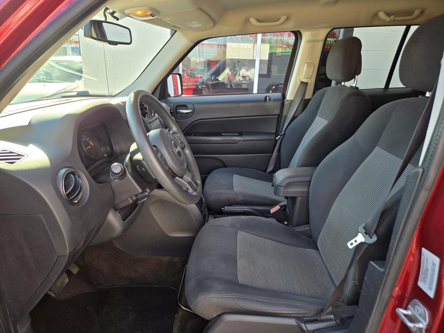 2015 Red Jeep Patriot Sport 2WD (1C4NJPBB7FD) with an 2.4L L4 DOHC 16V engine, Automatic transmission, located at 503 West Court, Seguin, TX, 78155, (830) 379-3373, 29.568621, -97.969803 - Photo#4