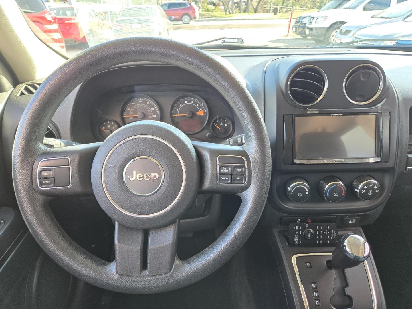 2015 Red Jeep Patriot Sport 2WD (1C4NJPBB7FD) with an 2.4L L4 DOHC 16V engine, Automatic transmission, located at 503 West Court, Seguin, TX, 78155, (830) 379-3373, 29.568621, -97.969803 - Photo#5