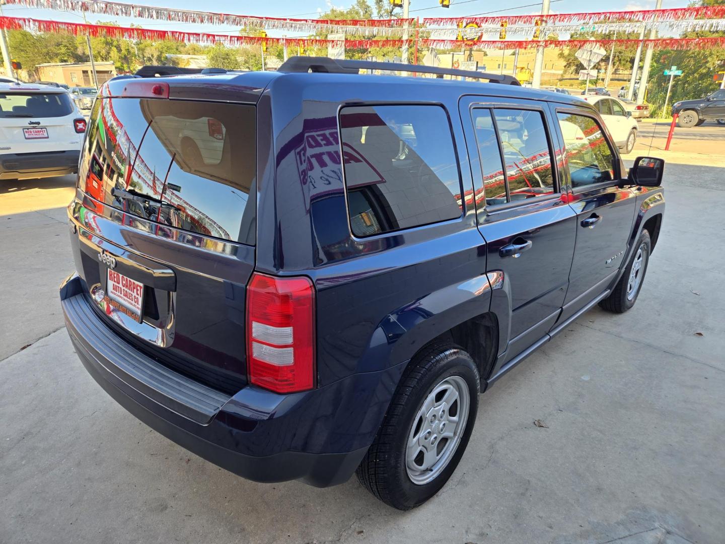 2016 Blue Jeep Patriot Sport 2WD (1C4NJPBA2GD) with an 2.0L L4 DOHC 16V engine, Automatic transmission, located at 503 West Court, Seguin, TX, 78155, (830) 379-3373, 29.568621, -97.969803 - 2016 Jeep Patriot Sport 2WD with a 2.0L L4 DOHC 16V, Automatic, Tilt, Cruise, AM/FM/AUX Stereo, Power Windows, Locks and Side Mirrors, Tinted Windows, Alloy Wheels, Rear Wiper, Rear Defroster and more!! - Photo#2