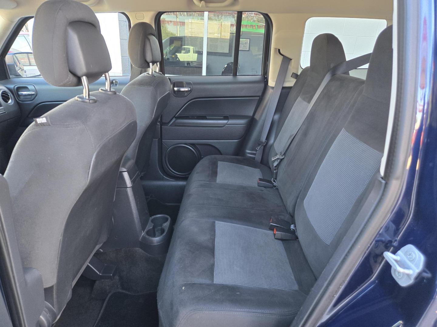 2016 Blue Jeep Patriot Sport 2WD (1C4NJPBA2GD) with an 2.0L L4 DOHC 16V engine, Automatic transmission, located at 503 West Court, Seguin, TX, 78155, (830) 379-3373, 29.568621, -97.969803 - 2016 Jeep Patriot Sport 2WD with a 2.0L L4 DOHC 16V, Automatic, Tilt, Cruise, AM/FM/AUX Stereo, Power Windows, Locks and Side Mirrors, Tinted Windows, Alloy Wheels, Rear Wiper, Rear Defroster and more!! - Photo#6