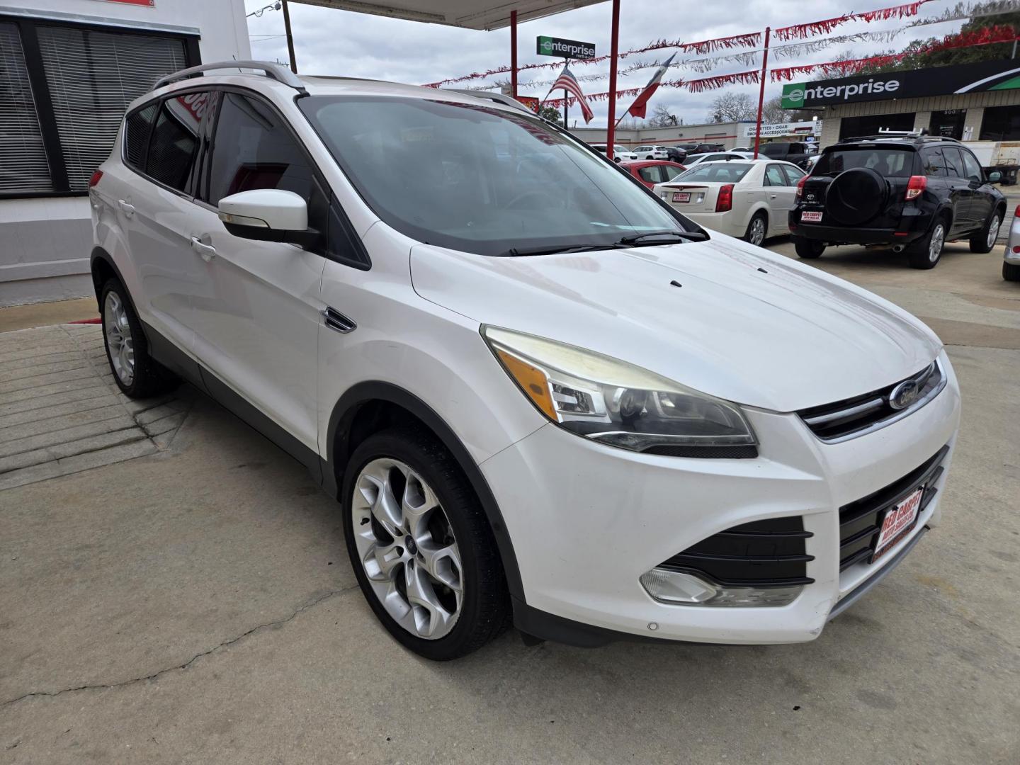 2014 WHITE Ford Escape Titanium FWD (1FMCU0JX4EU) with an 1.6L L4 DOHC 16V engine, 6-Speed Automatic transmission, located at 503 West Court, Seguin, TX, 78155, (830) 379-3373, 29.568621, -97.969803 - Photo#1