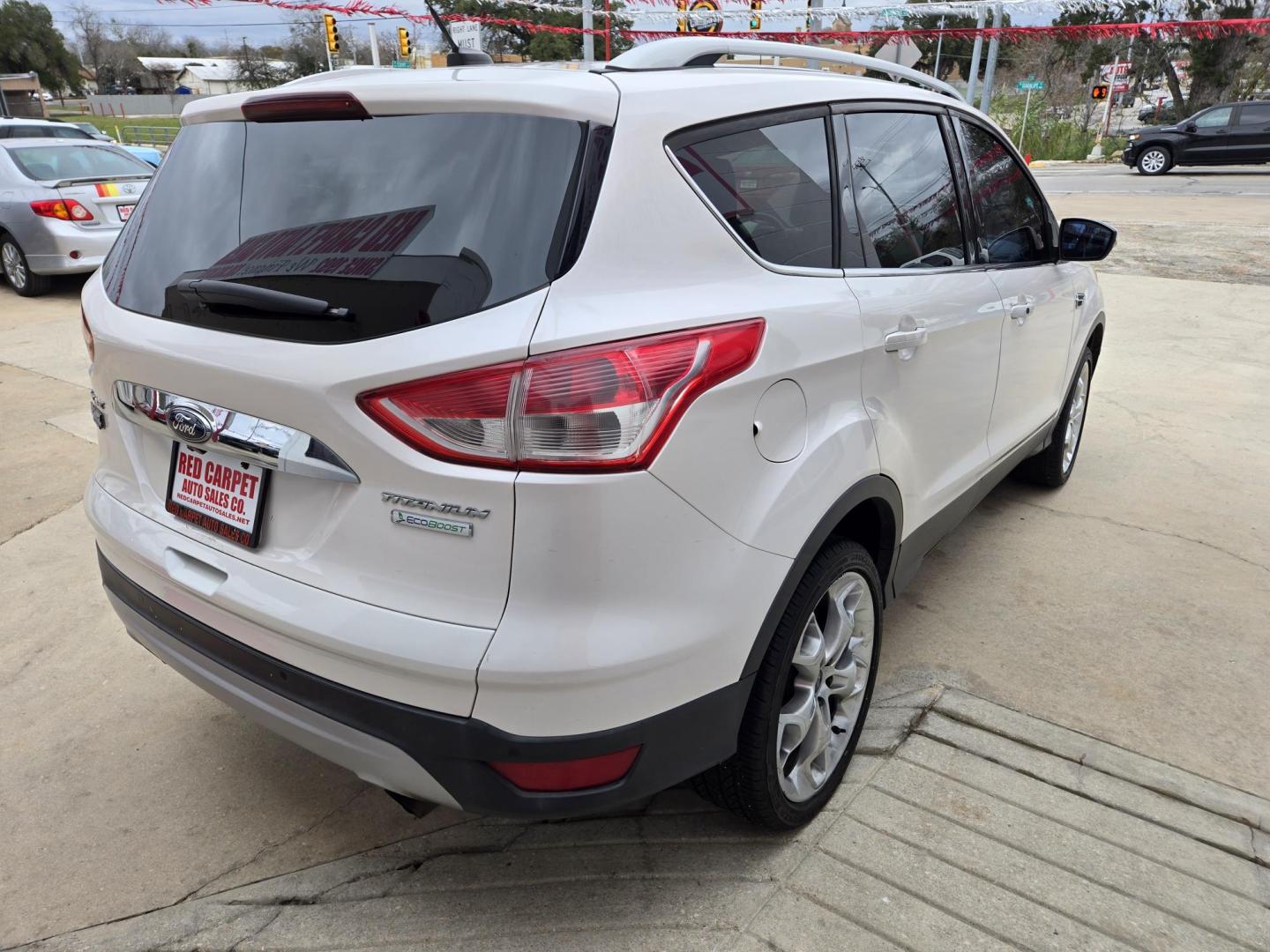 2014 WHITE Ford Escape Titanium FWD (1FMCU0JX4EU) with an 1.6L L4 DOHC 16V engine, 6-Speed Automatic transmission, located at 503 West Court, Seguin, TX, 78155, (830) 379-3373, 29.568621, -97.969803 - Photo#3