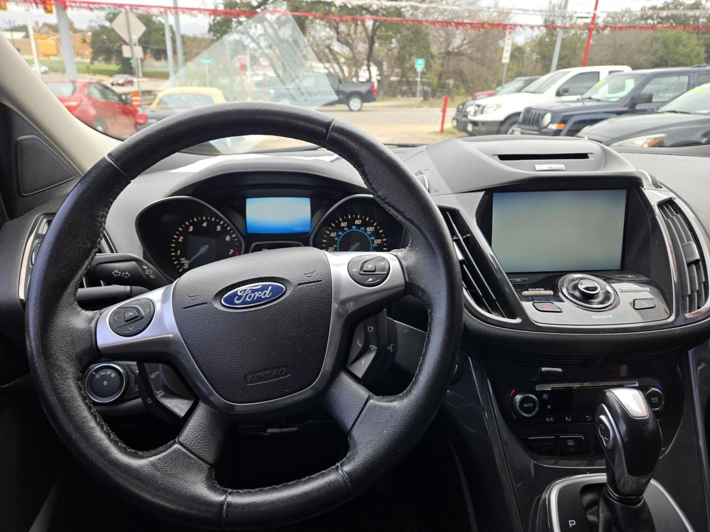2014 WHITE Ford Escape Titanium FWD (1FMCU0JX4EU) with an 1.6L L4 DOHC 16V engine, 6-Speed Automatic transmission, located at 503 West Court, Seguin, TX, 78155, (830) 379-3373, 29.568621, -97.969803 - Photo#4