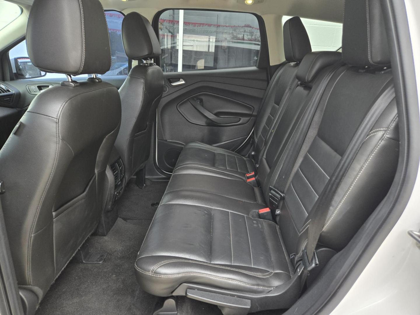 2014 WHITE Ford Escape Titanium FWD (1FMCU0JX4EU) with an 1.6L L4 DOHC 16V engine, 6-Speed Automatic transmission, located at 503 West Court, Seguin, TX, 78155, (830) 379-3373, 29.568621, -97.969803 - Photo#8