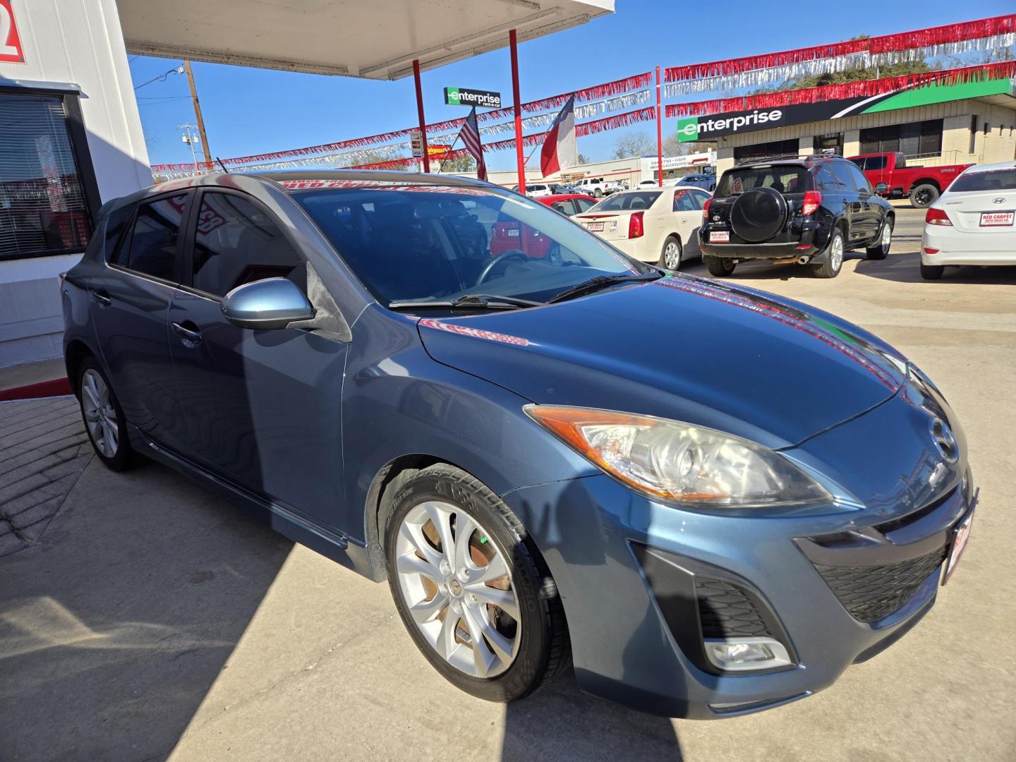 2010 Blue Mazda MAZDA3 s Grand Touring 5-Door (JM1BL1H67A1) with an 2.5L L4 DOHC 16V engine, Automatic transmission, located at 503 West Court, Seguin, TX, 78155, (830) 379-3373, 29.568621, -97.969803 - 2010 Mazda MAZDA3 s Grand Touring 5-Door with a 2.5L L4 DOHC 16V, Automatic, Tilt, Cruise, AM/FM/CD/AUX Stereo, Power Windows, Locks and Side Mirrors, Bluetooth, Power Sunroof, Tinted Windows, Alloy Wheels and more!! - Photo#1