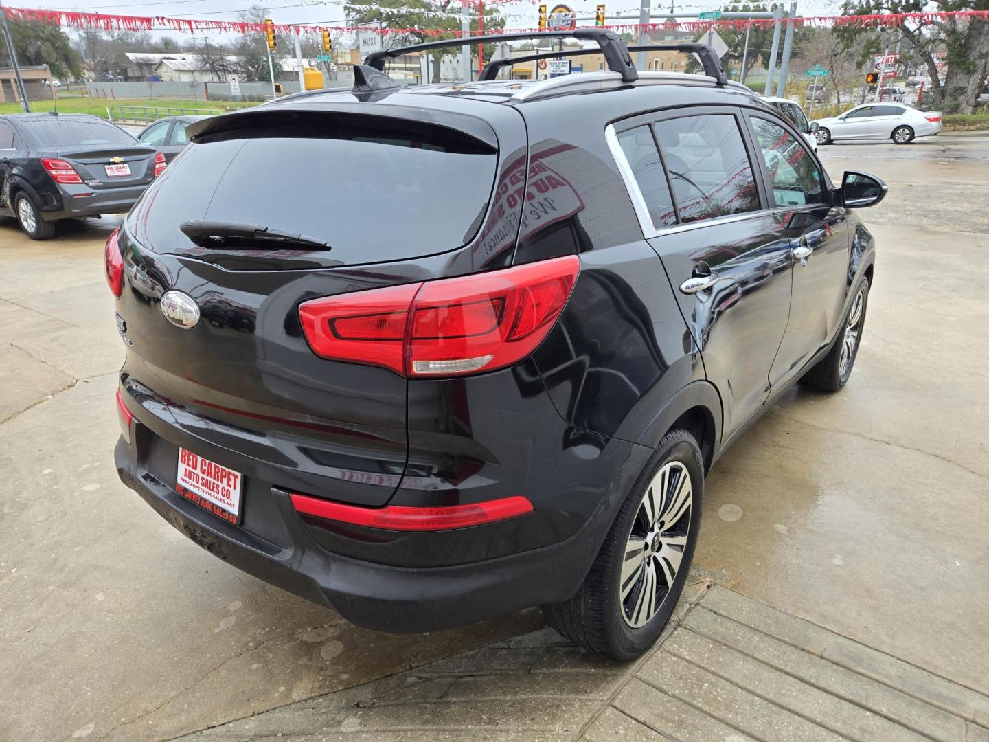 2015 Black Kia Sportage EX FWD (KNDPC3AC1F7) with an 2.4L V6 DOHC 24V engine, 6-Speed Automatic transmission, located at 503 West Court, Seguin, TX, 78155, (830) 379-3373, 29.568621, -97.969803 - Photo#3