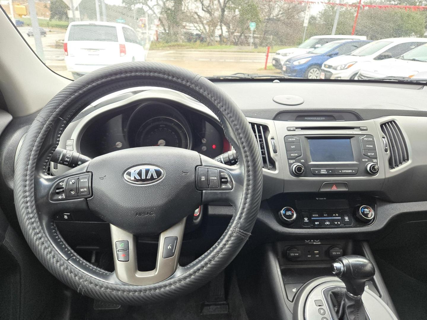 2015 Black Kia Sportage EX FWD (KNDPC3AC1F7) with an 2.4L V6 DOHC 24V engine, 6-Speed Automatic transmission, located at 503 West Court, Seguin, TX, 78155, (830) 379-3373, 29.568621, -97.969803 - Photo#5