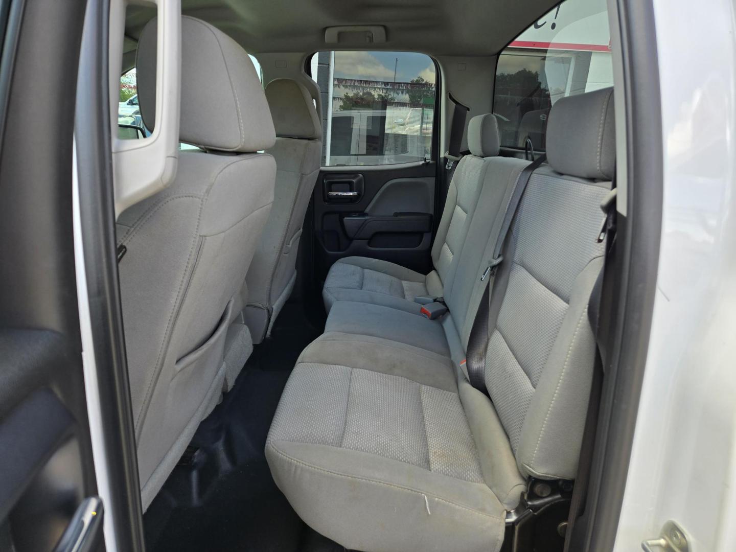2018 WHITE Chevrolet Silverado 1500 Work Truck Double Cab 4WD (1GCVKNECXJZ) with an 5.3L V8 OHV 16V engine, 6A transmission, located at 503 West Court, Seguin, TX, 78155, (830) 379-3373, 29.568621, -97.969803 - 2018 Chevrolet Silverado 1500 Work Truck Double Cab 4WD with a 5.3L V8 OHV 16V, Automatic, Tilt, Cruise, AM/FM Touchscreen Stereo, Power Windows, Locks and Side Mirrors, Bluetooth, Front Bench Seating, Tinted Windows, Automatic Headlights, Onstar Capability, Grille Guard, Camper Shell, Running Board - Photo#6