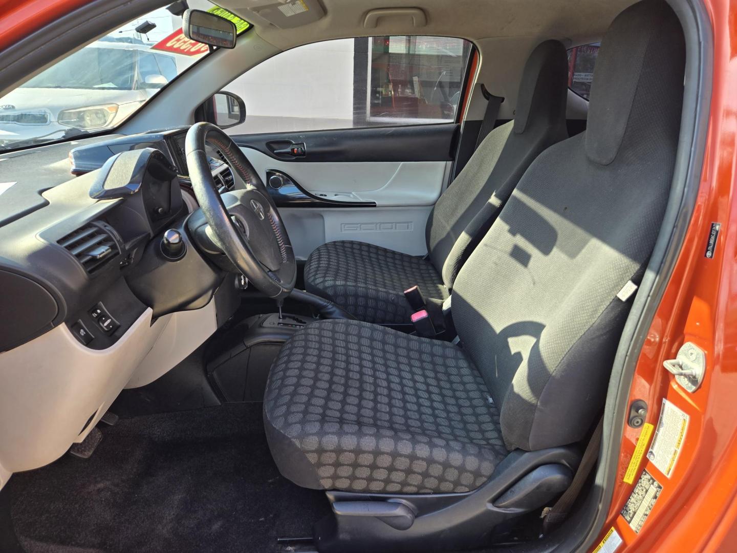 2012 Orange Scion iQ 3-Door Hatchback AT (JTNJJXB06CJ) with an 1.3L L4 engine, Continuously Variable Transmission transmission, located at 503 West Court, Seguin, TX, 78155, (830) 379-3373, 29.568621, -97.969803 - 2012 Scion iQ 3-Door Hatchback with a 1.3L L4, Automatic, Tilt, AM/FM/AUX Touchscreen Stereo, Power Windows, Locks and Side Mirrors, Tinted Windows, Rear Defroster and more!! - Photo#4