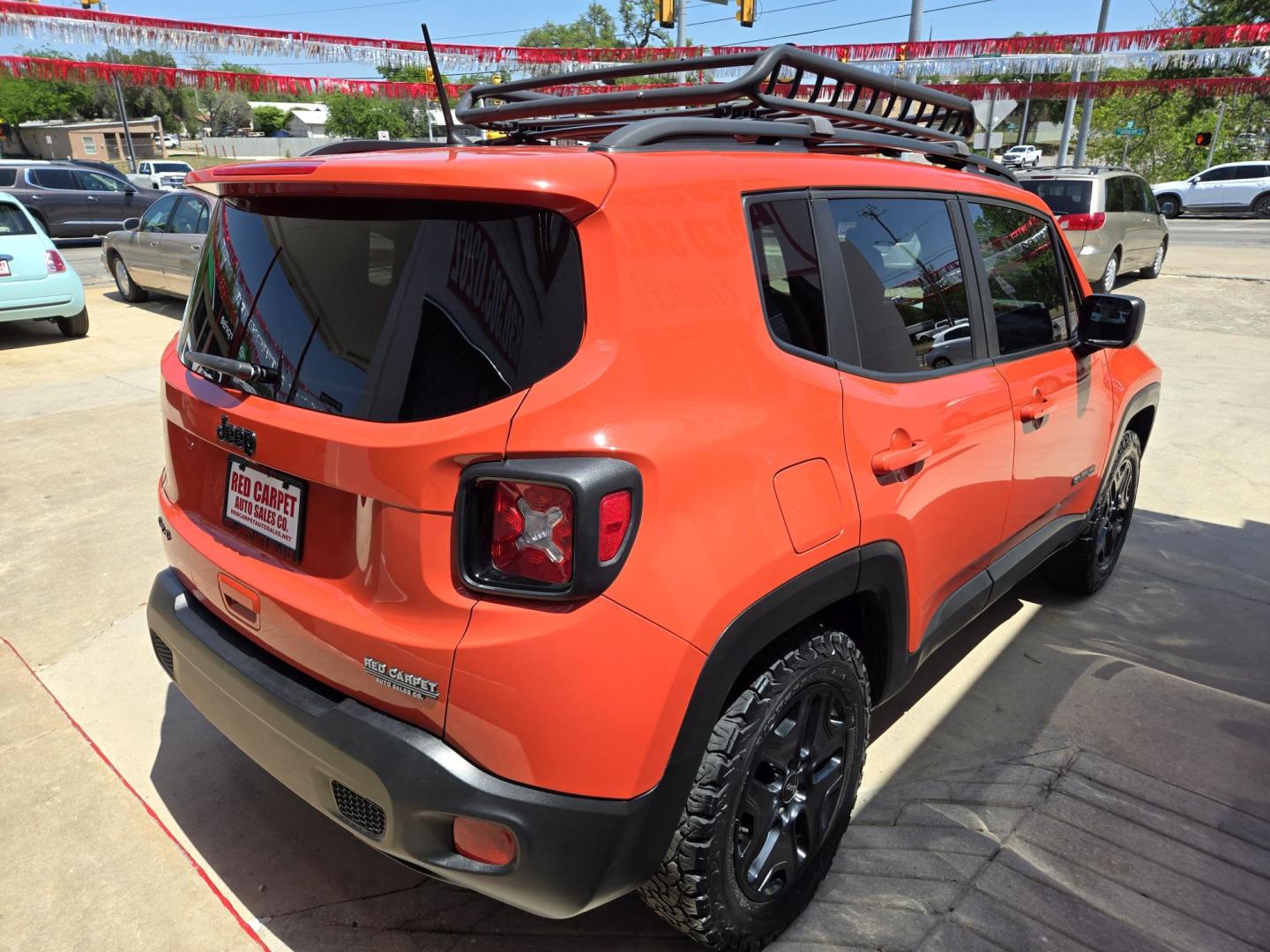 2018 Orange Jeep Renegade Sport 4WD (ZACCJBAB5JP) with an 2.4L L4 DOHC 16V engine, Automatic transmission, located at 503 West Court, Seguin, TX, 78155, (830) 379-3373, 29.568621, -97.969803 - Photo#2