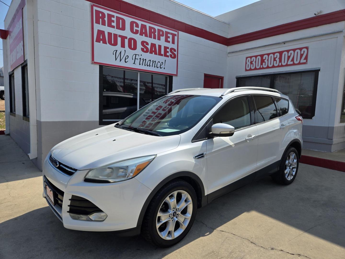 2014 WHITE Ford Escape Titanium FWD (1FMCU0J95EU) with an 2.0L L4 DOHC 16V engine, 6-Speed Automatic transmission, located at 503 West Court, Seguin, TX, 78155, (830) 379-3373, 29.568621, -97.969803 - 2014 Ford Escape Titanium FWD with a 2.0L L4 DOHC 16V, Automatic, Tilt, Cruise, AM/FM/CD Stereo, Power Windows, Locks, Seat and Side Mirrors, Bluetooth, Leather Seats, Tinted Windows, Dual Climate Control, Heated Seats, Power Rear Hatch, Alloy Wheels, Backup Camera, Bumper Sensors, Rear Wiper, Rear - Photo#0